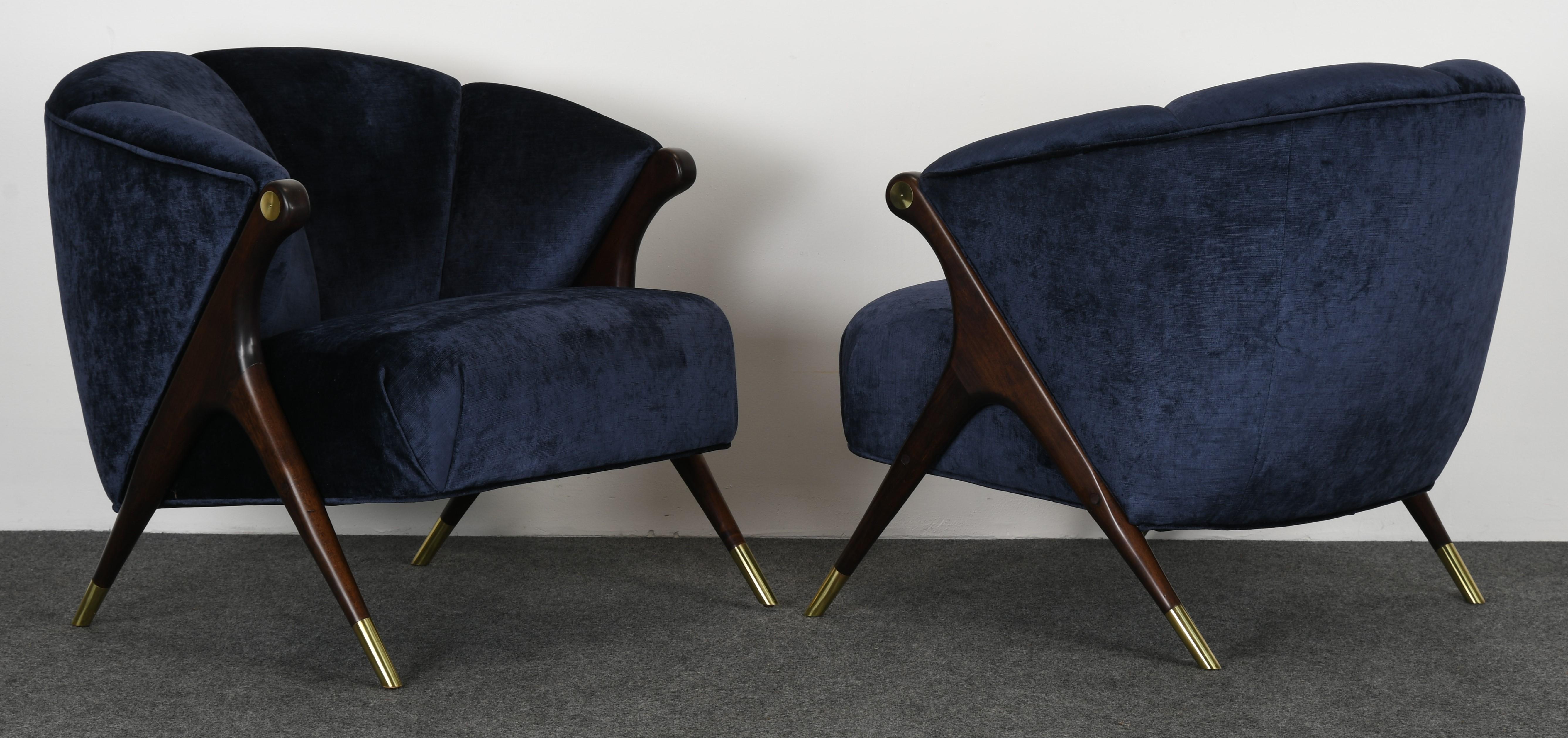 A pair of Karpen lounge chairs reupholstered in Ming Blue by Mokum for Holly Hunt. Wood has been beautifully refinished. Ready to place in your home.

Dimensions: 29.75