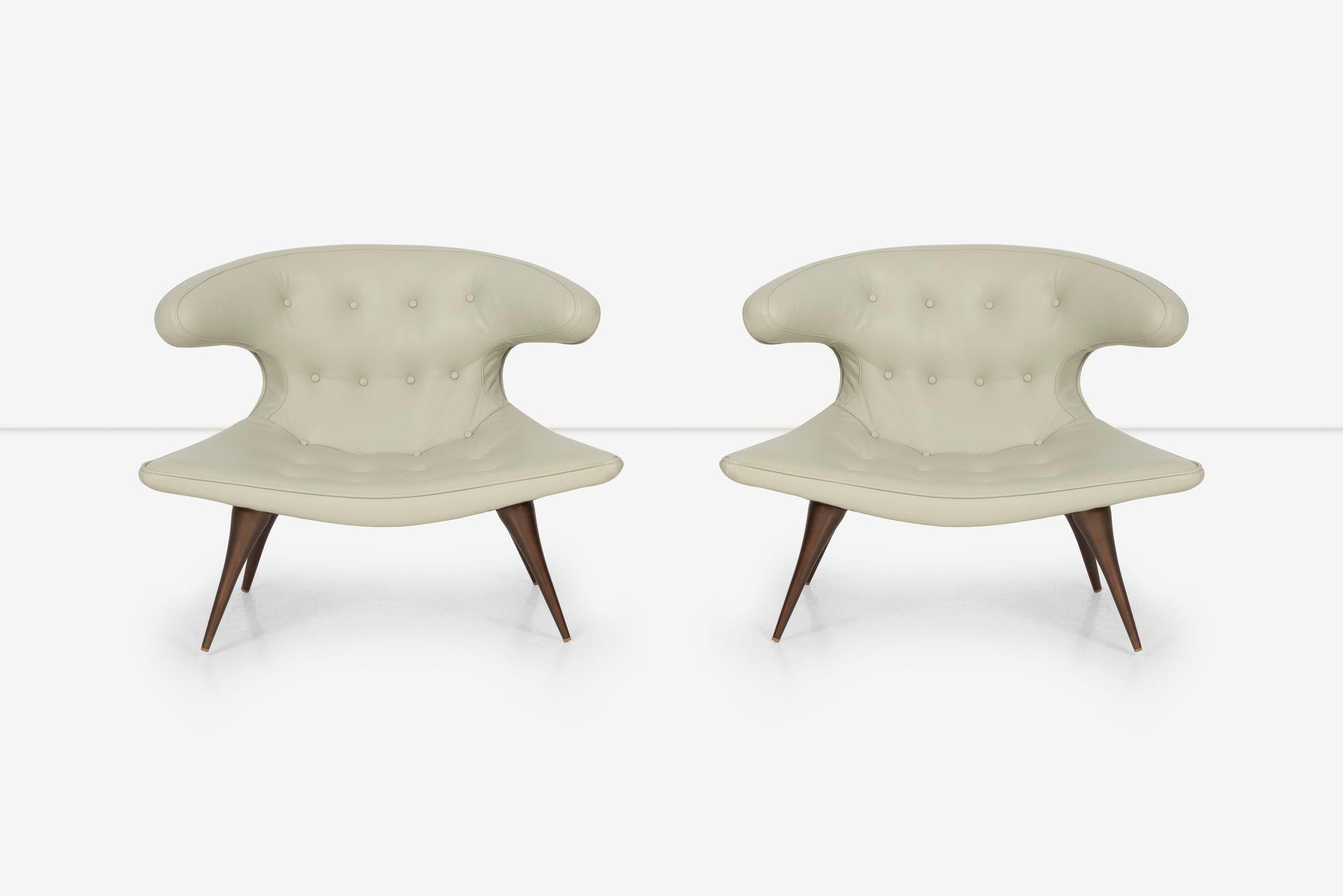 Pair of Karpen of California Horn Lounge Chairs, reupholstered with tufted buttons in Spinneybeck Leather.
Bronze painted legs, Seat Height 12.50 center and , 14