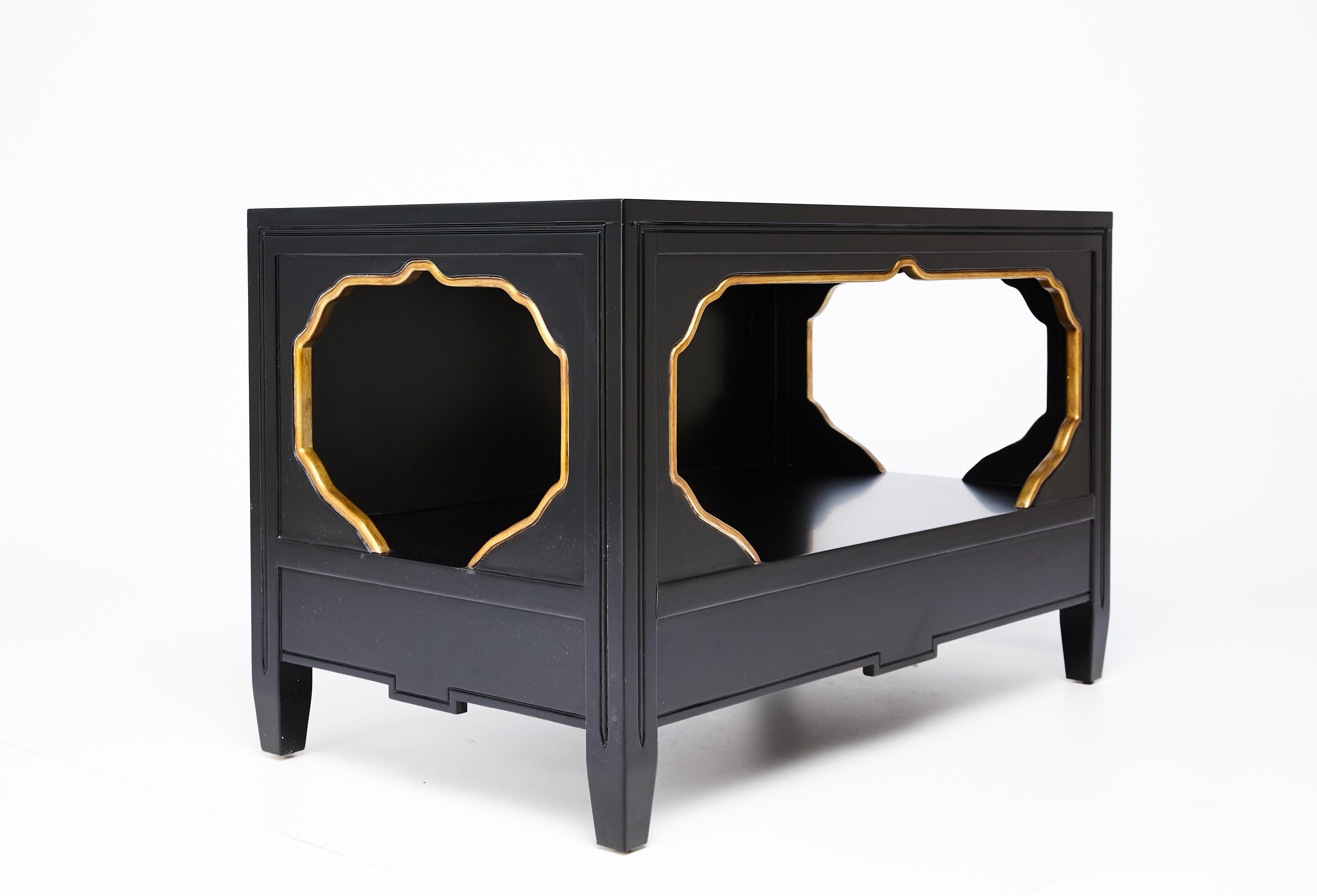 Pair of Kelly Wearstler nightstands / tables, originally designed for the Viceroy Miami, circa 2008 These are an unused pair in black lacquer with gold highlights. The design evokes the vintage glamor of Dorothy Draper's España furniture in a