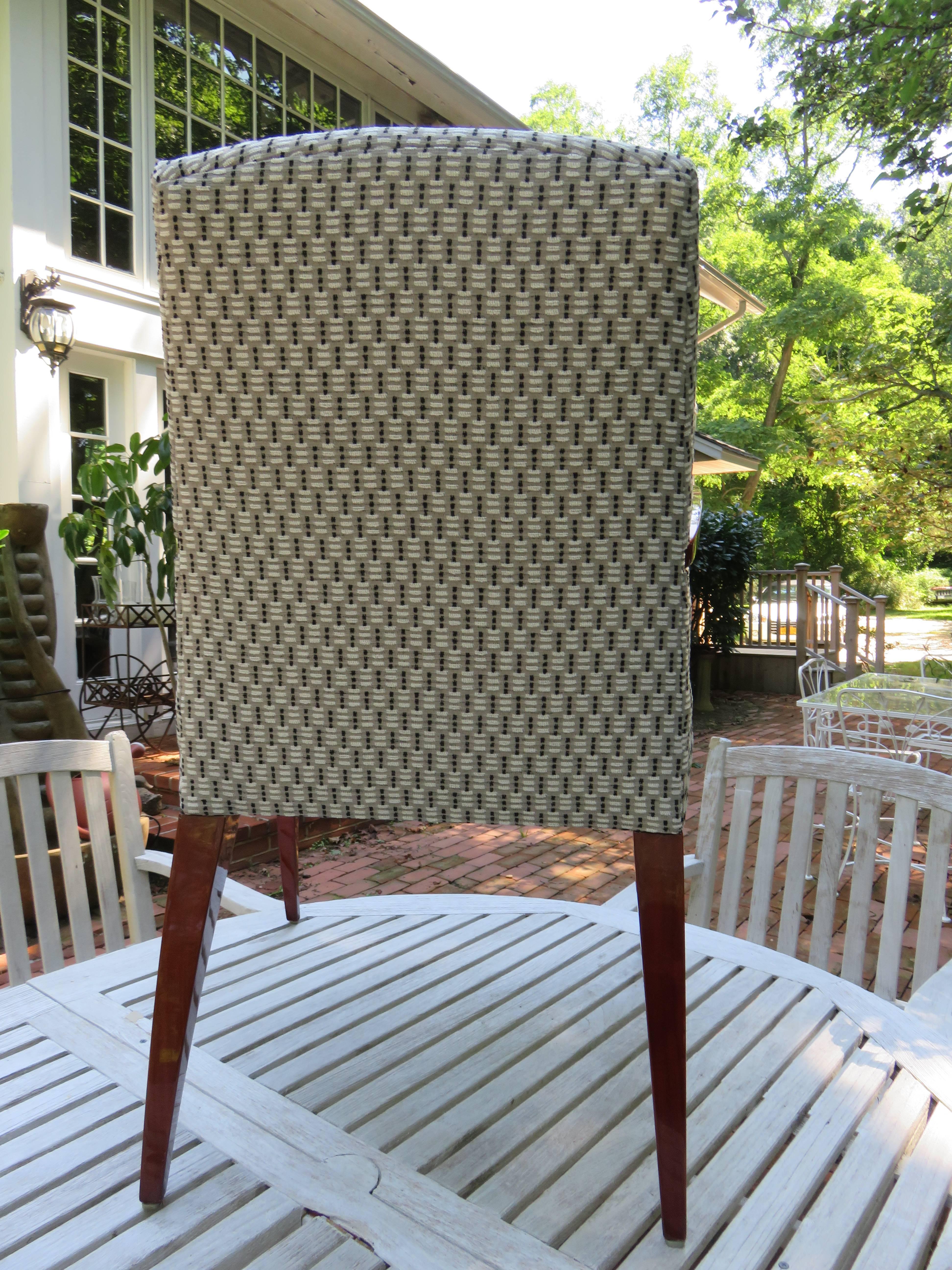 Pair of Kenneth Winslow studio crafted armchairs. Solid cherrywood frames, new upholstery in a Larsan black, grey and white herringbone fabric. High style, crafted to perfection, immaculate.