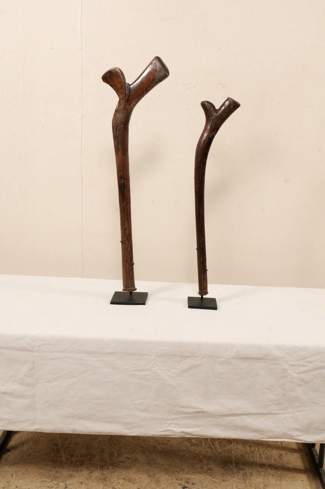 Pair of Kiakavo Wooden Clubs from the Fiji Islands on Custom Black Stands In Good Condition For Sale In Atlanta, GA