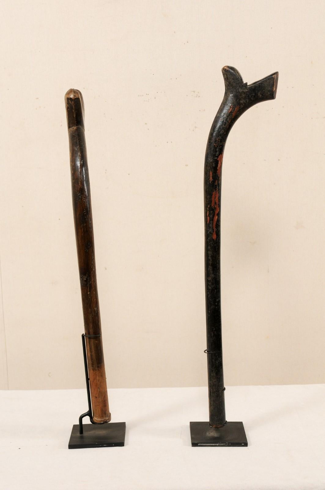 Carved Pair of Kiakavo Wooden Clubs from the Fiji Islands on Custom Stands For Sale