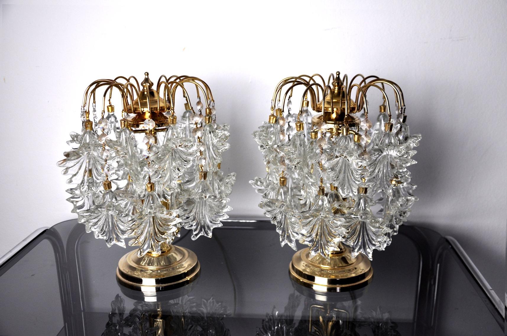 Very nice pair of kinkeldey lamps designed and produced in Germany in the 1970s. Cut crystals spread over a golden metal structure. Very beautiful design objects that will illuminate your interior wonderfully. Electricity checked, marks of time
