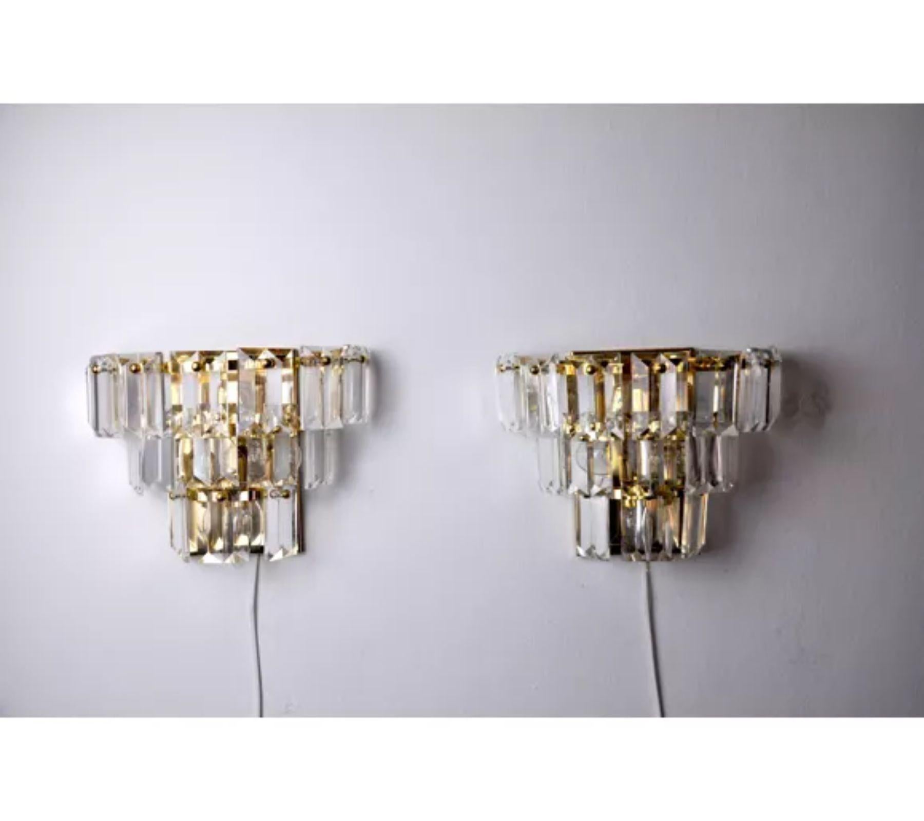 Very nice pair of Kinkeldey wall lights designed and produced in Germany in the 1970s. Very nice design object that will illuminate your interior wonderfully. Electricity checked, marks of time relating to the age of the object.