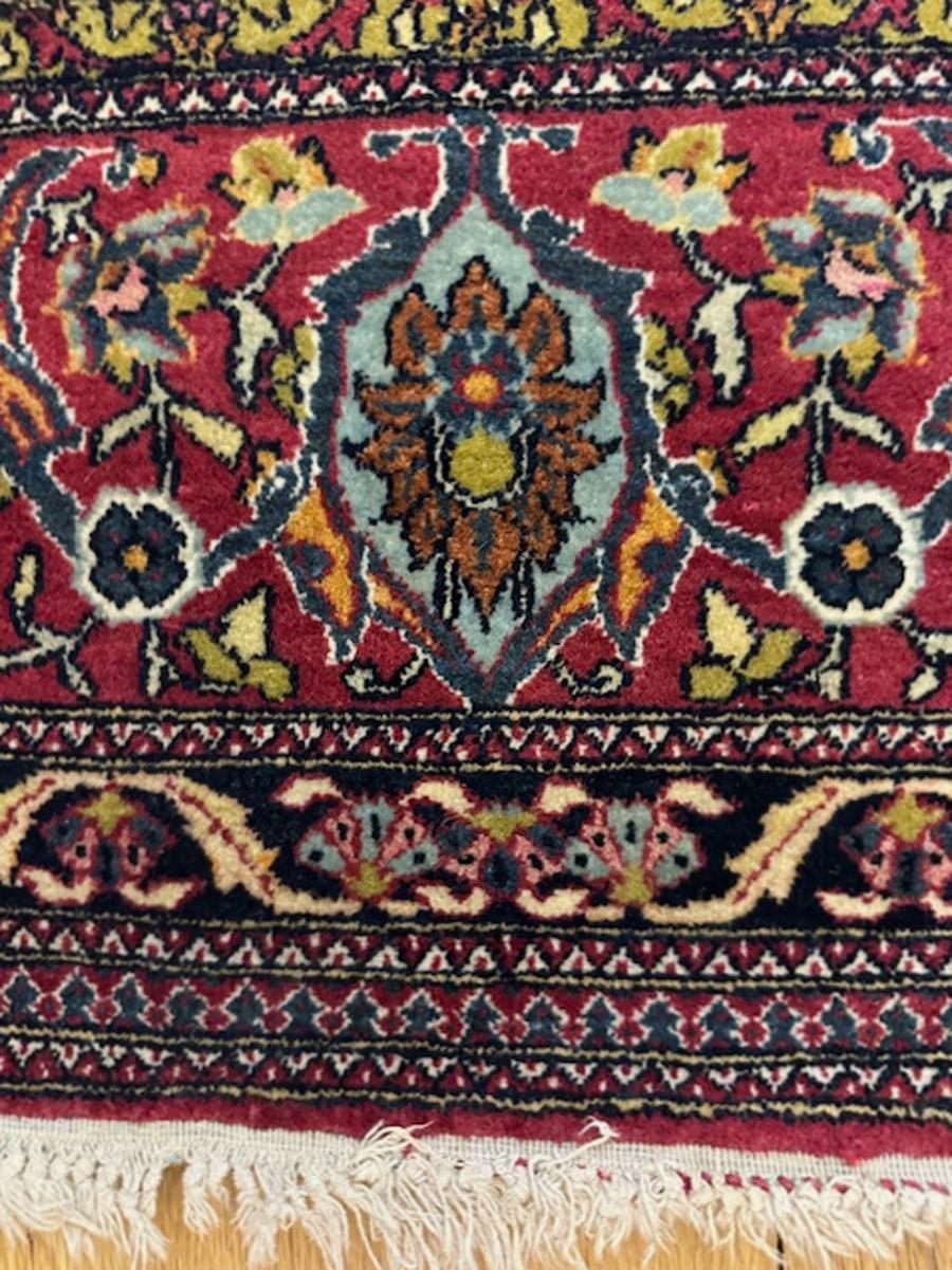 Kirman rug from south Persia (Iran)

Age: circa 1910

Size: 6′.8″x4′.9″ (203×145 cm)

This rug is one of a matched pair.The rugs are sold separately or as a set.

This finely knotted Persian city rug has an ivory field displaying a complex