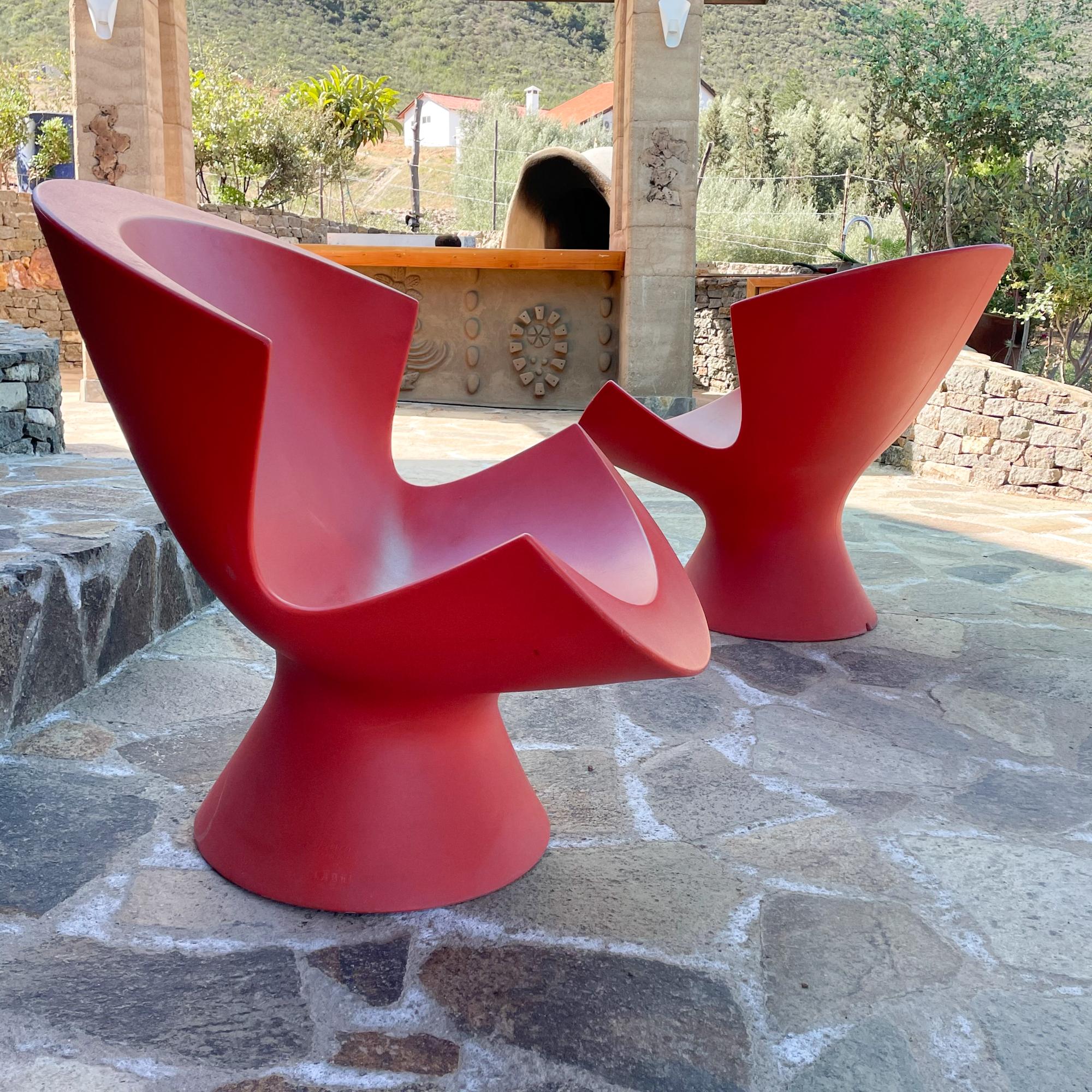 For your consideration a set of two (2) Kite chairs designed by Karim Rashid for Label.

Beautiful modern sculptural design in hot pink color. Made of high quality plastic, these chairs are perfect for the outdoors, clever design which includes a