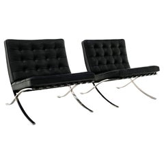 Used Pair of Knoll Black Leather & Stainless Steel Barcelona Chairs, Signed