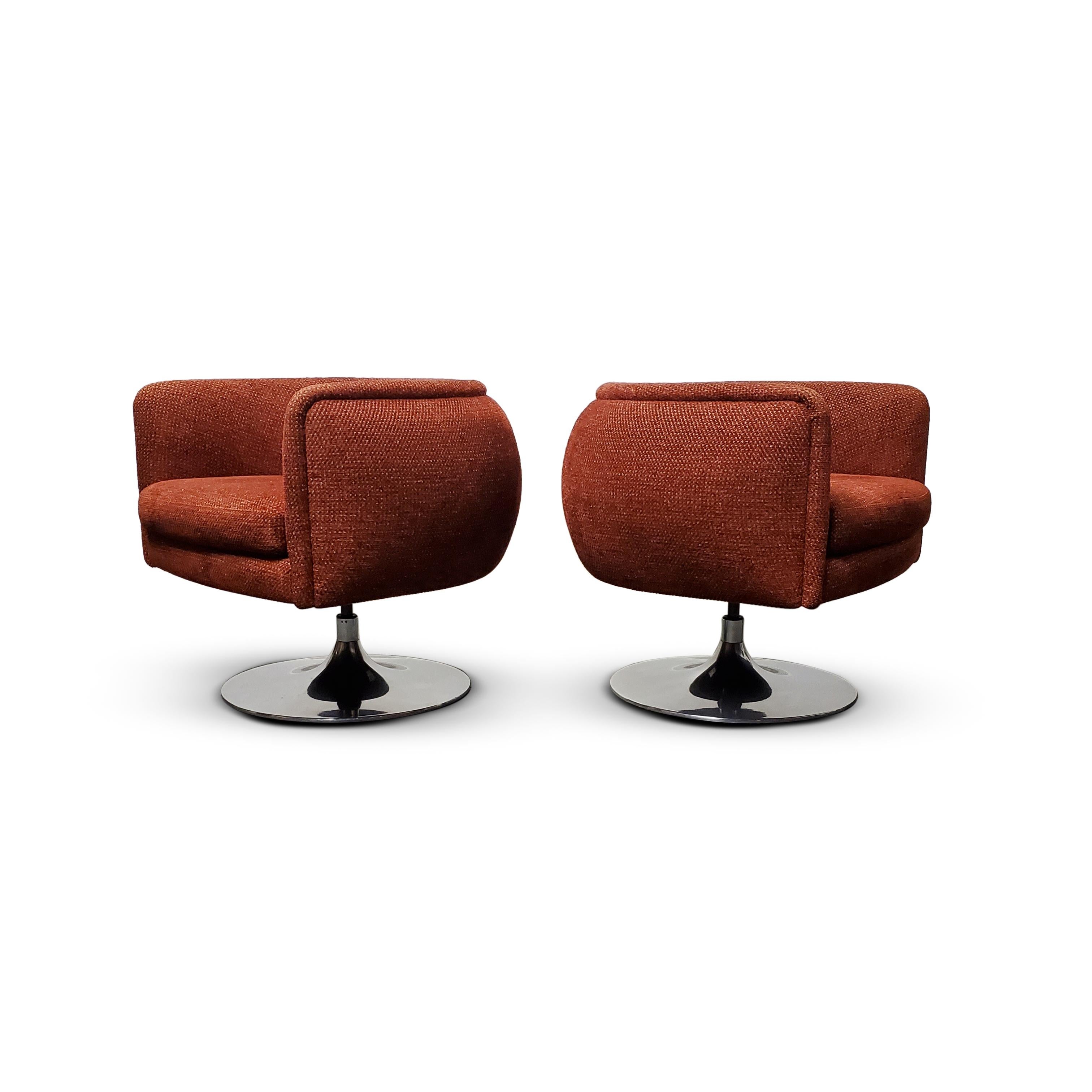 Pair of Knoll D'Urso swivel lounge chairs.