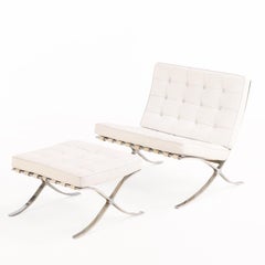 Pair of Knoll International Barcelona Chairs with Matching Ottomans, C. 1988.