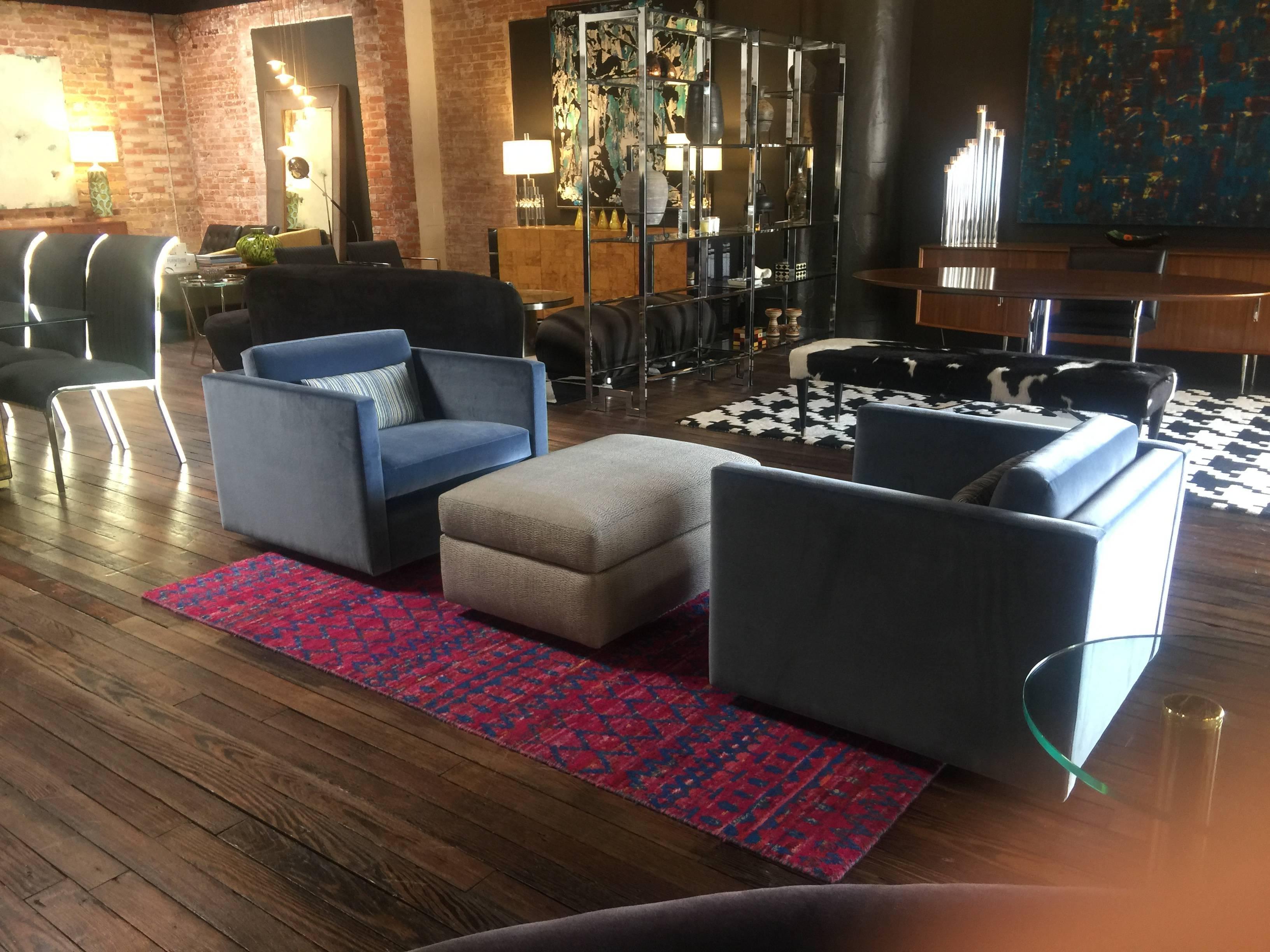 Knoll Lounge Chairs by Charles Pfister newly upholstered in blue velvet. A ottoman is upholstered in Holly Hunt fabric.  Ottoman is 33