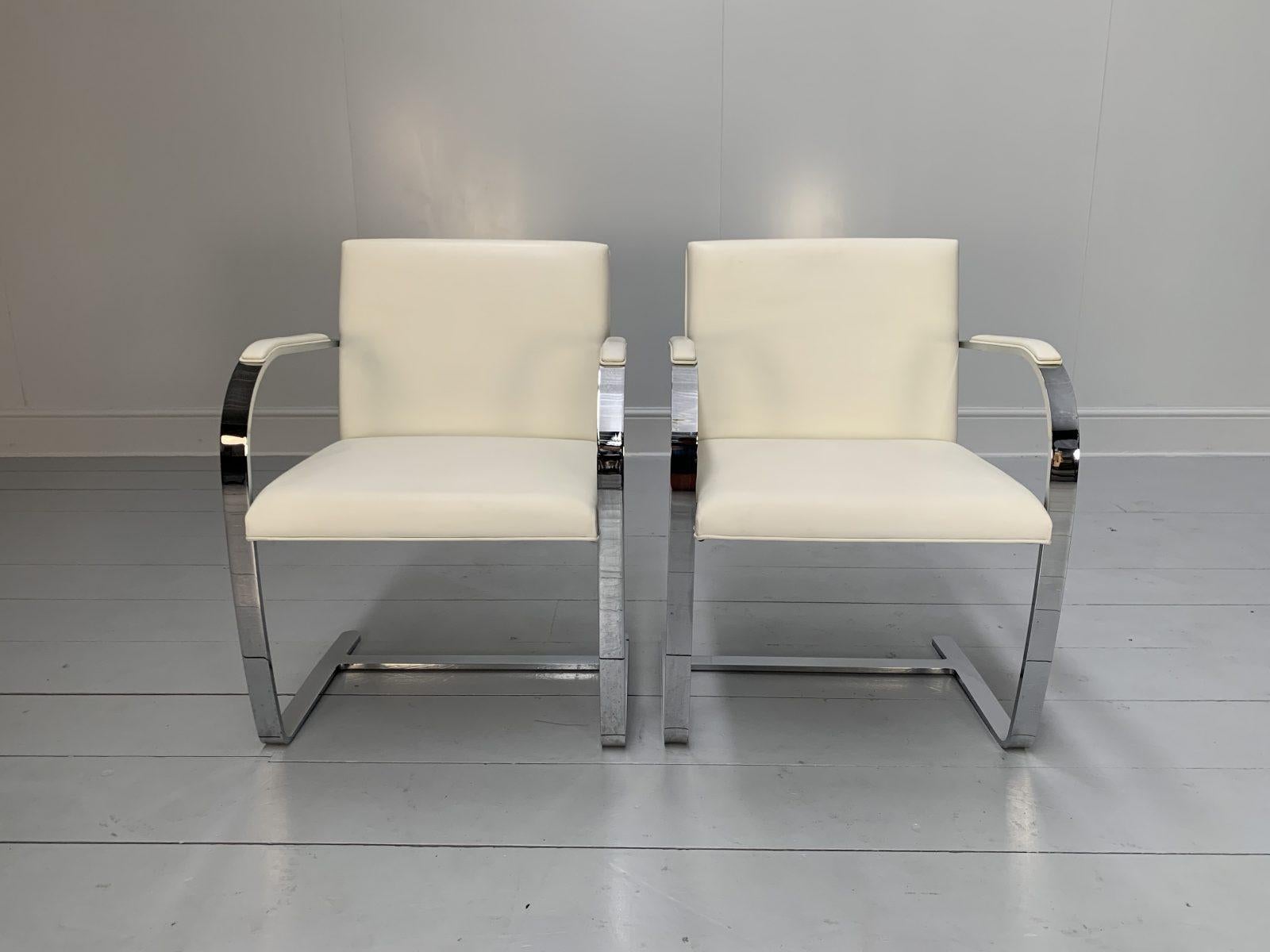 This is a sublime, immaculately-presented, original pair of “Brno Flat Bar” Armchairs with Arm Pads in White Leather, manufactured by the leading Furniture manufacturer, Knoll Studio.

In a world of temporary pleasures, Knoll Studio creates