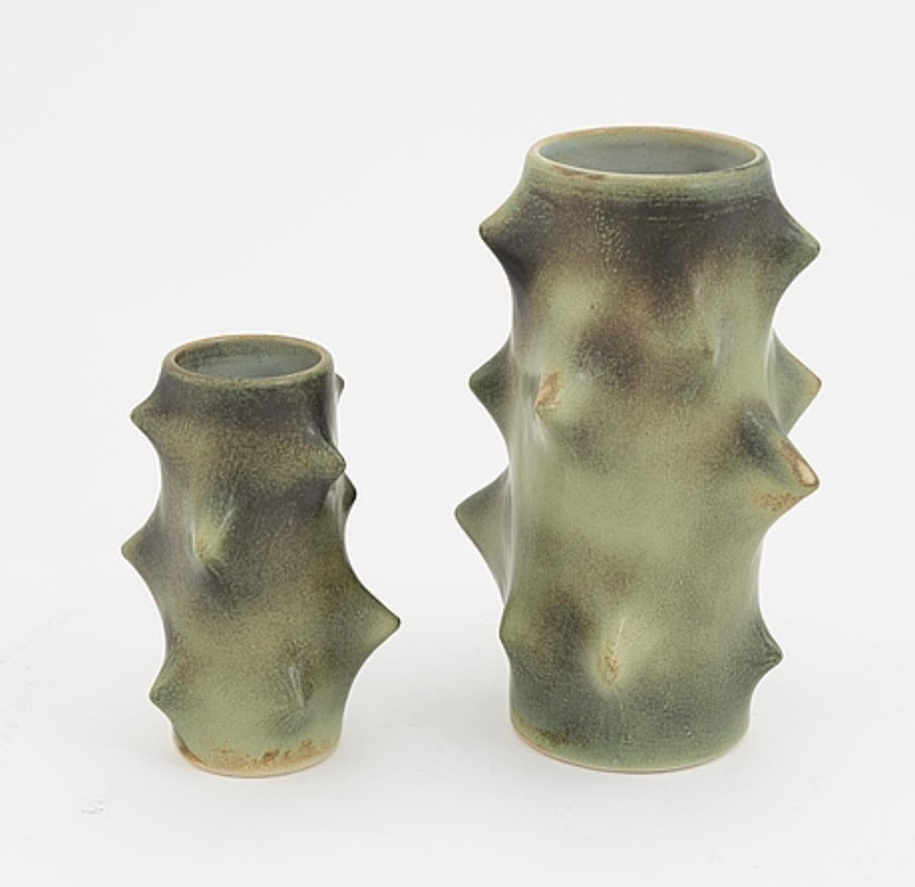 Pair of green “Rose Thorn” vases by Knud Basse in good vintage condition.