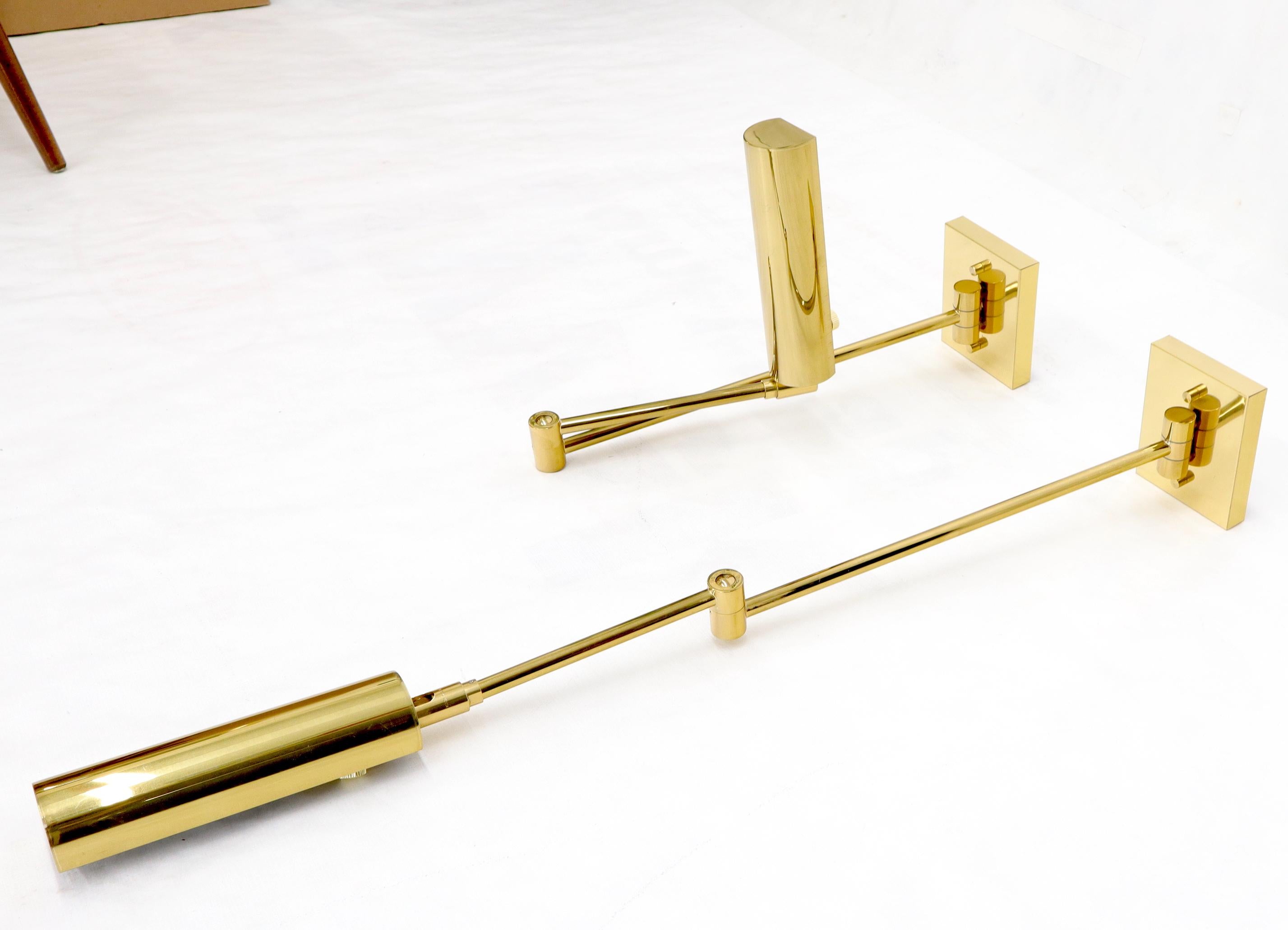 Mid-Century Modern new with tags (old stock) solid brass articulating arm sconces by Koch & Lowy.