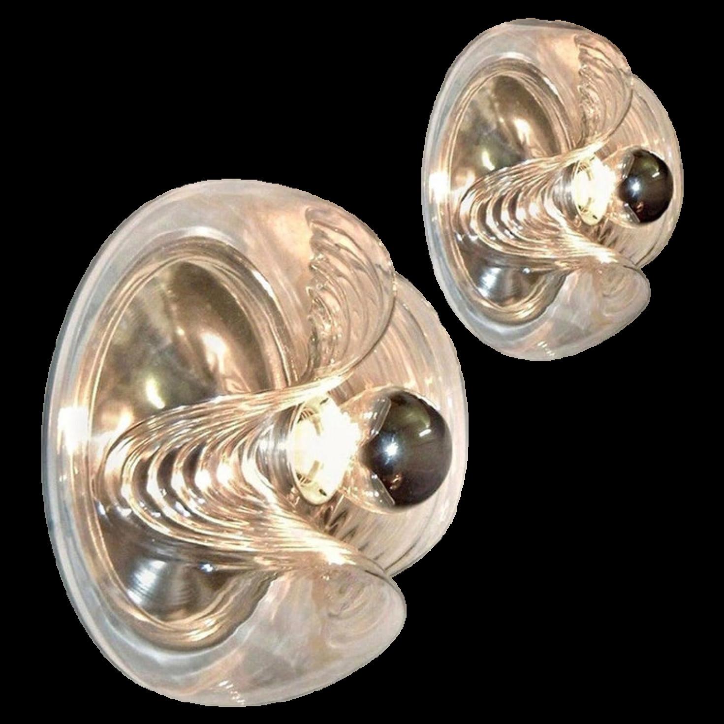 Pair of mid-20th century flush mount or wall sconces designed by Koch & Lowy for Peill & Putzler in the 1970s. Featuring a clear glass globe shade with a waved or ribbed molded bubble form, casting a stunning rippled light across a wall or ceiling.