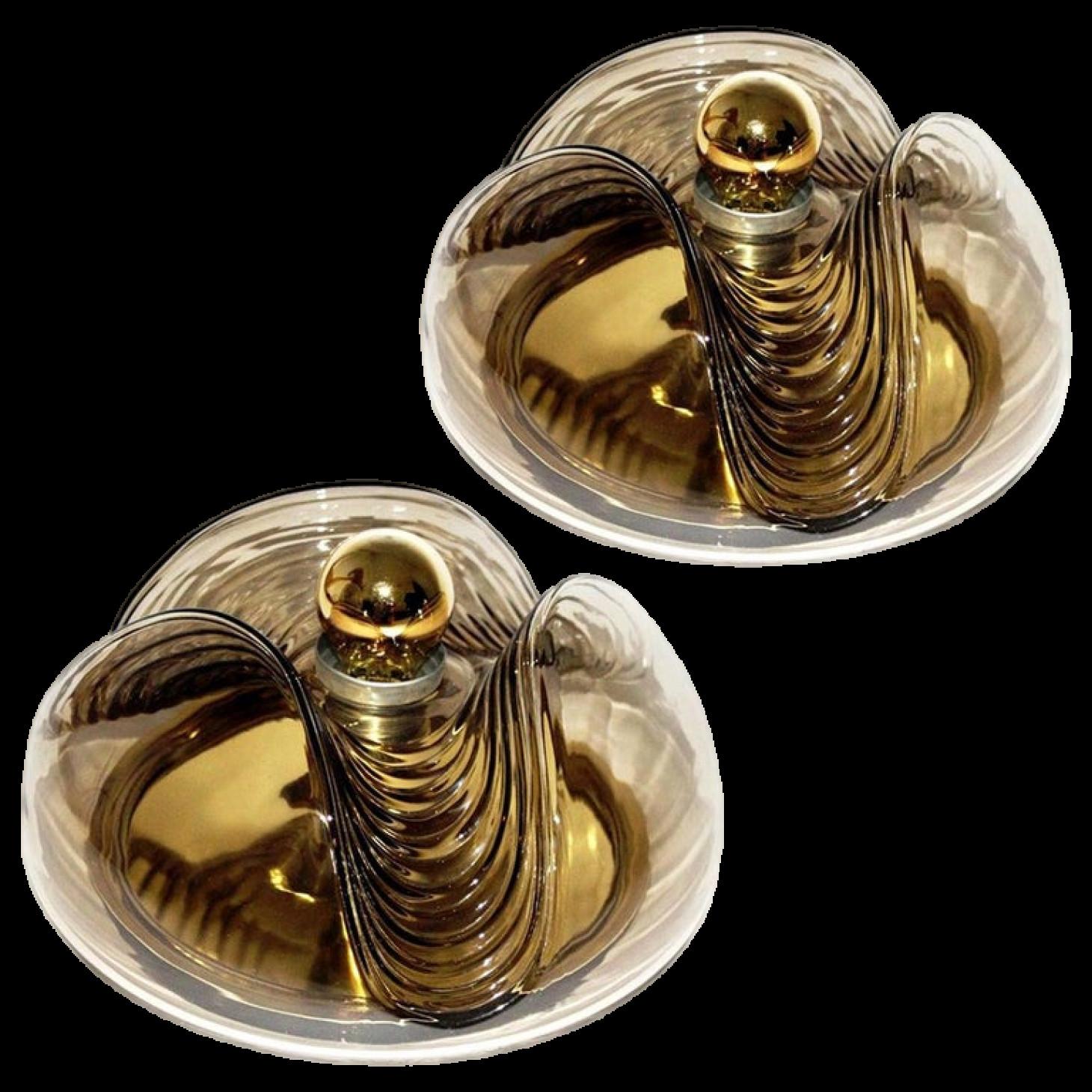 Midcentury flushmount wall lights or sconces designed by Koch & Lowy for Peill & Putzler in the 1970s. Featuring a smoked glass globe shade with a waved/ribbed molded bubble form, casting a stunning rippled light across a wall or ceiling.

Each