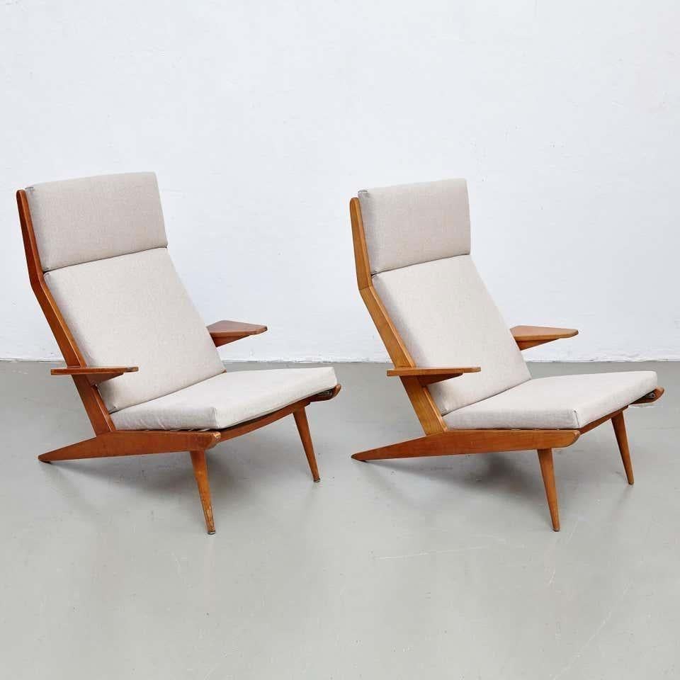 High back lounge chairs by Koene Oberman, circa 1960.

Originated in Denmark

In good original condition, with minor wear consistent with age and use, preserving a beautiful patina.

New upholstery.

