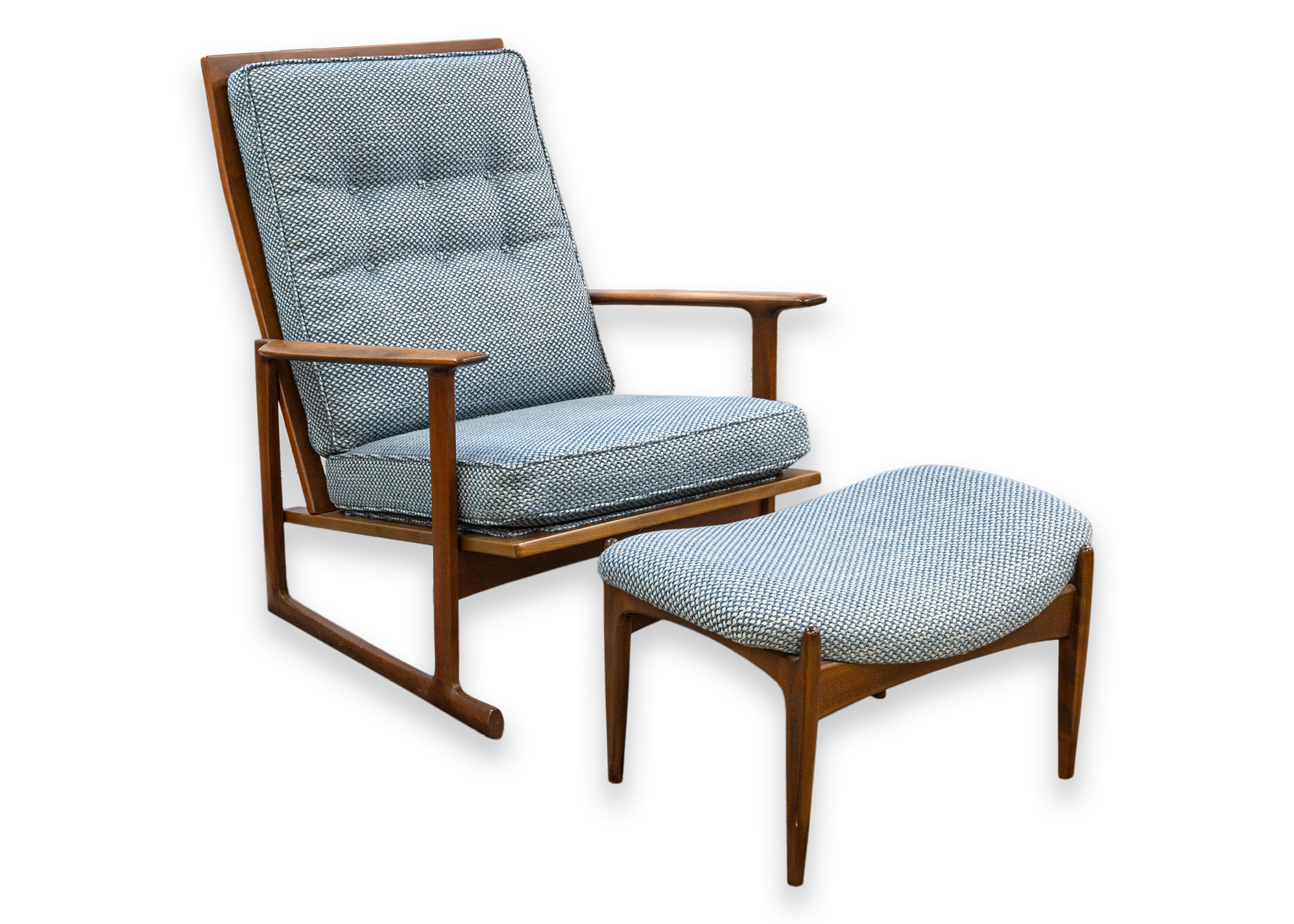 A pair of Kofod Larsen for Selig Sled chairs with matching ottomans. This is a seriously beautiful set of Danish mid century lounge chairs. This set includes two chairs and two matching ottomans. Each chair features the iconic Sled chair wood frame