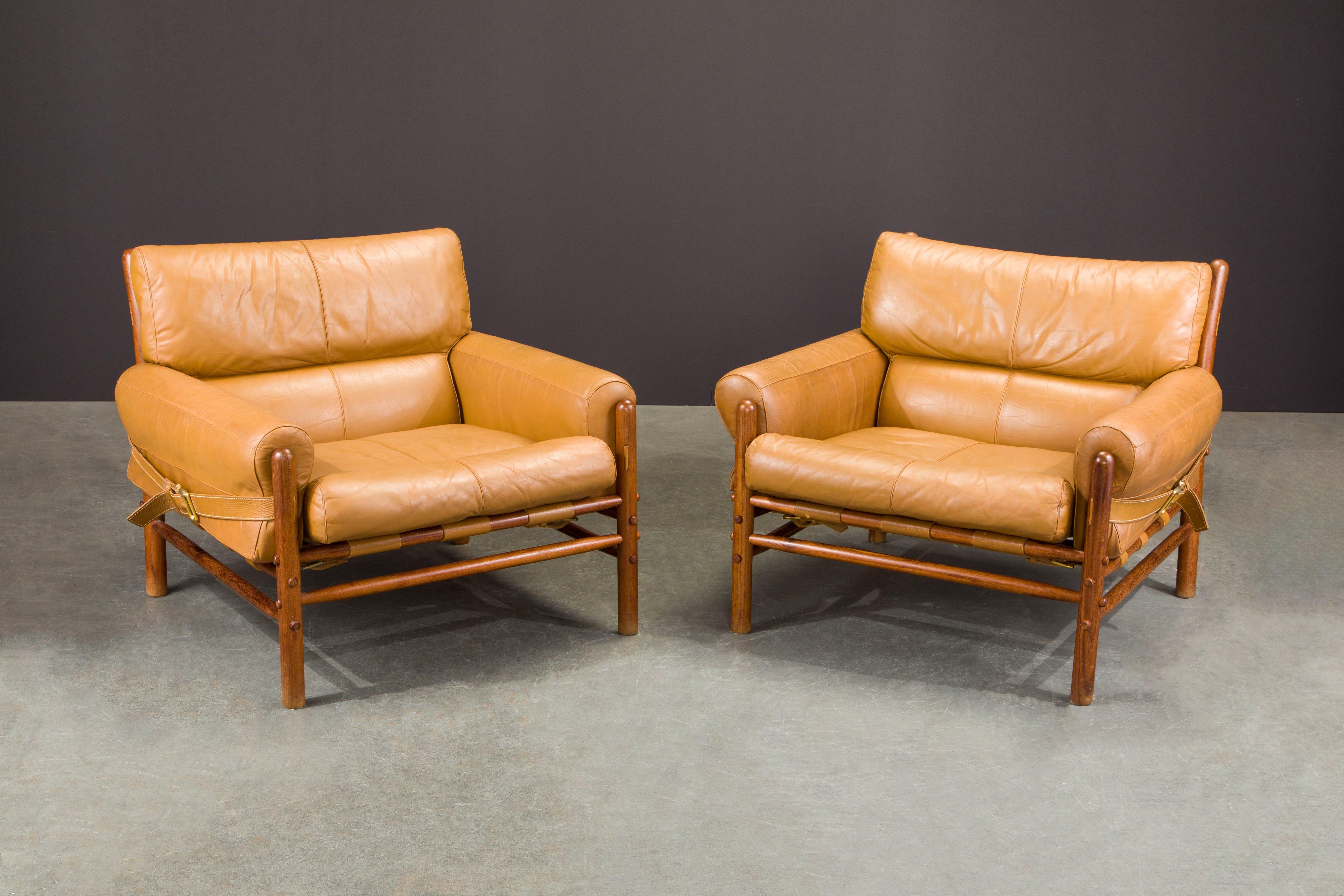 This rare pair of 'Kontiki' easy armchairs by Arne Norell (1970s) have such incredible leather, for those who love light vintage age in their leather - this is a great pair for you. 

Also ideal for collectors, this pair is signed with Scanform