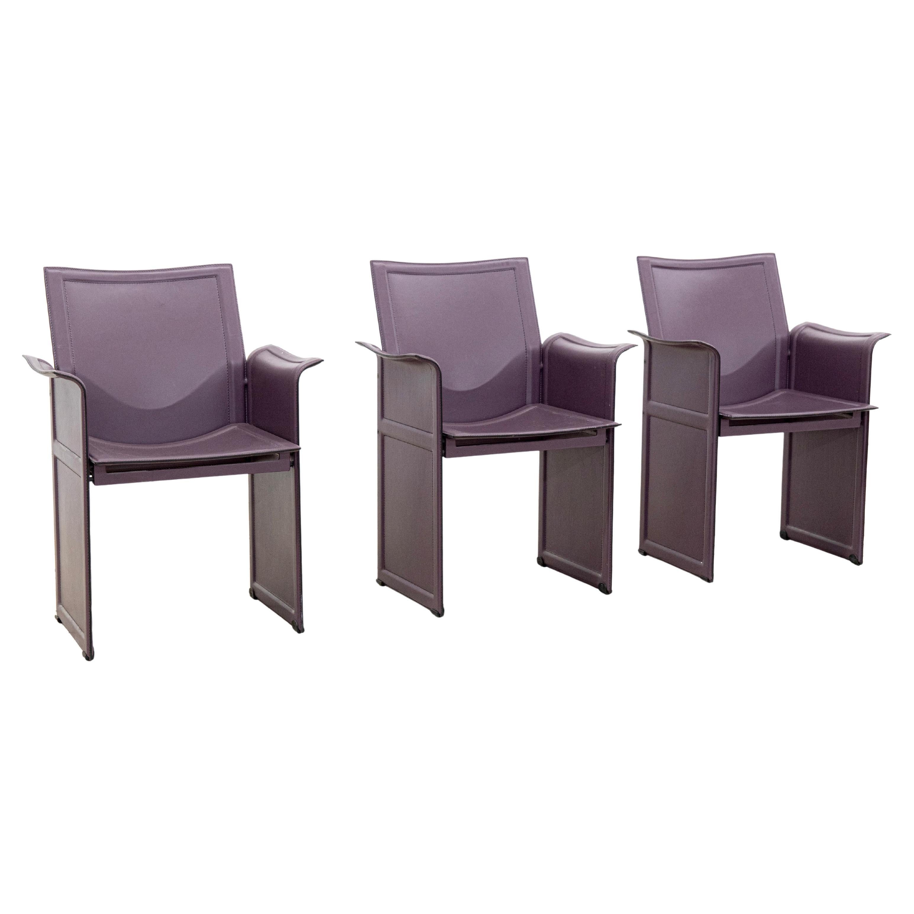 Coppia di sedie in pelle "Korium" di Tito Agnoli per Matteo Grassi