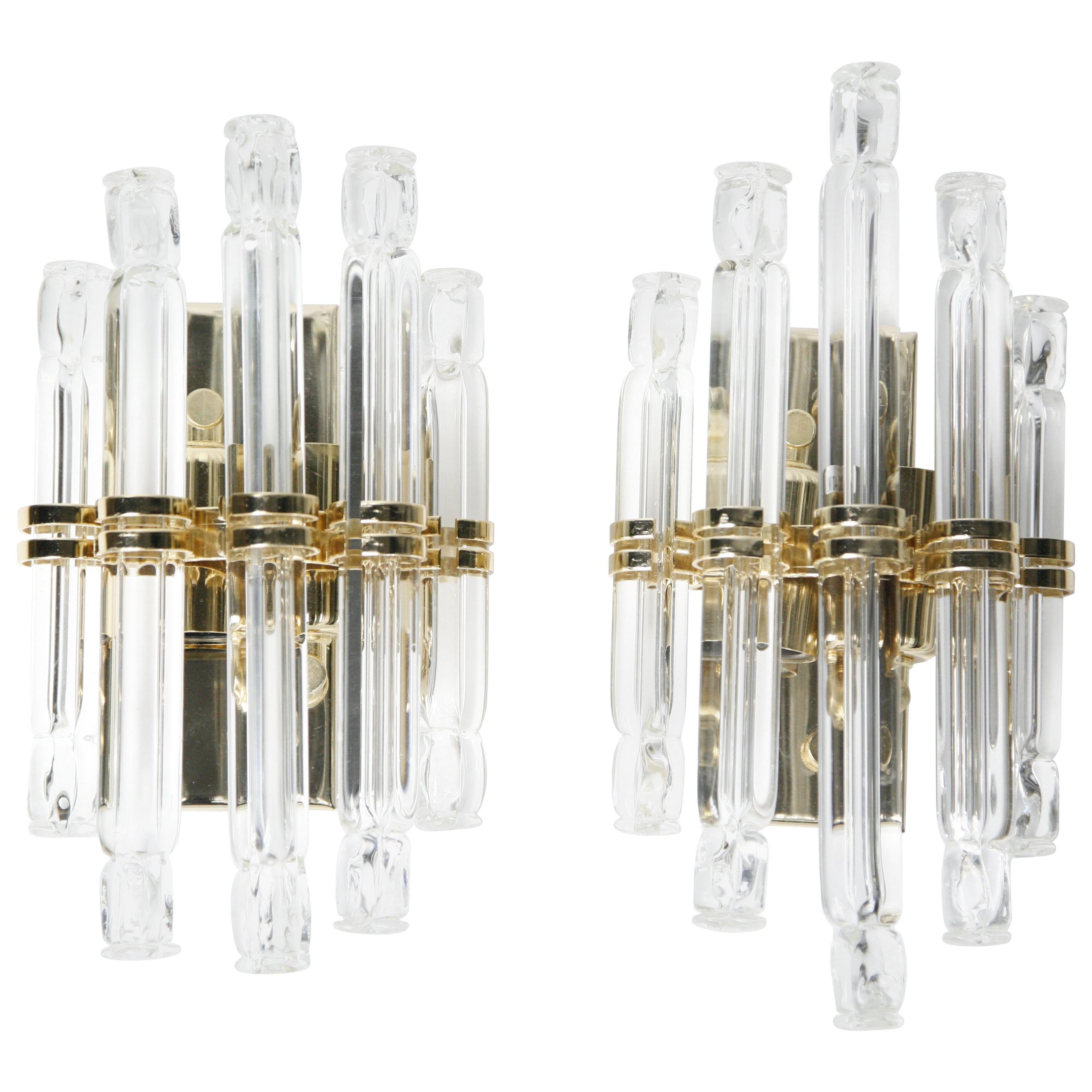 Pair of Kowatz leuchten sconces Germany, 1980, consisting of gilded frames with 5 individual crystal glass rods as a shade, elegant look.
Nicely detailed with tiny gold turn switch.
Hold two candelabra bulbs each, rewired for the US.

Priced as a