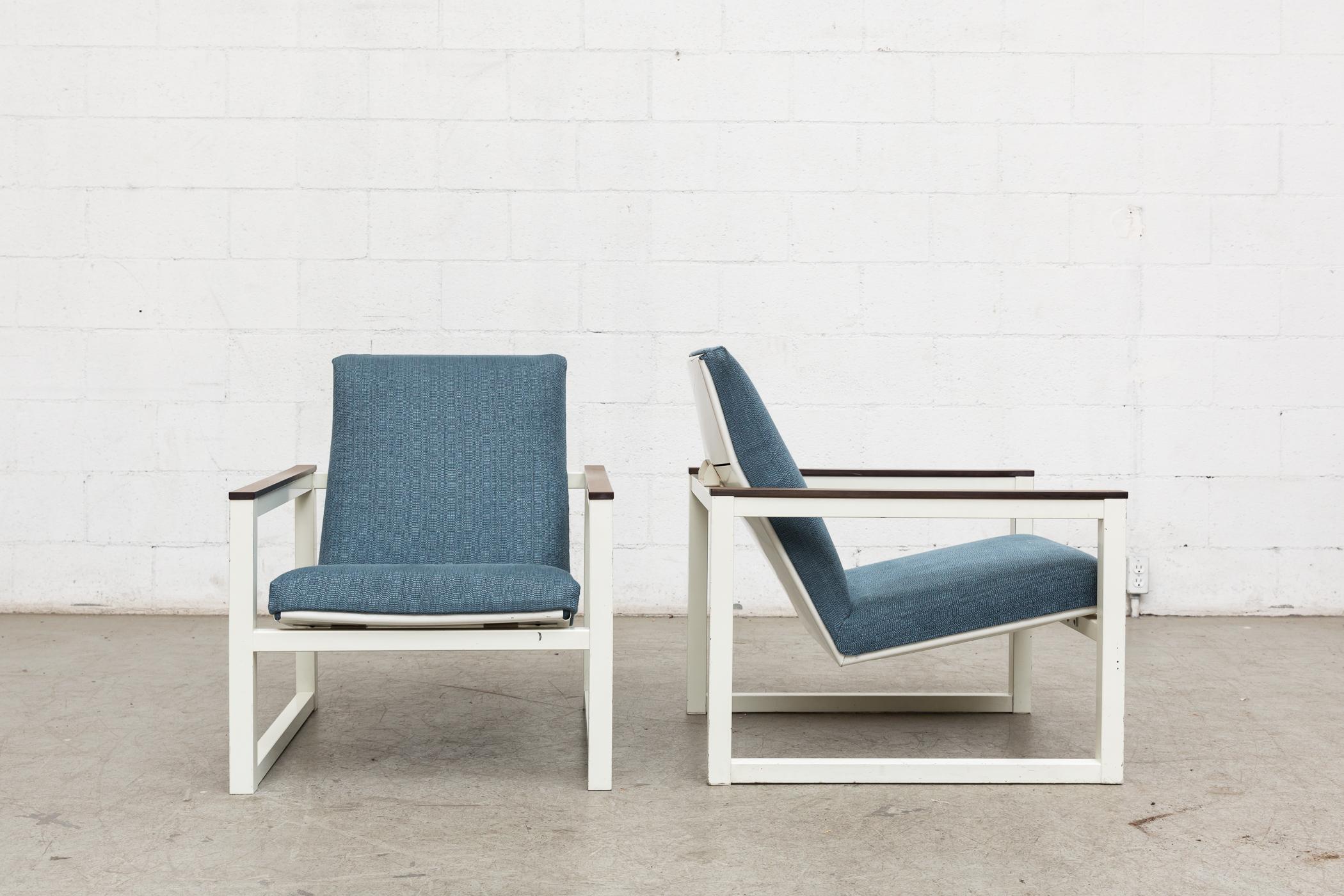 Pair of Mid-Century Cube Chairs Designed by Friso Kramer and Tjerk Reijenga for Pilastro. Newly Upholstered in Robins Egg Blue Fabric. White Enameled Metal Frames with Brown Formica Arm Rests, Visible Wear with Some Scratching to the Frame. Another