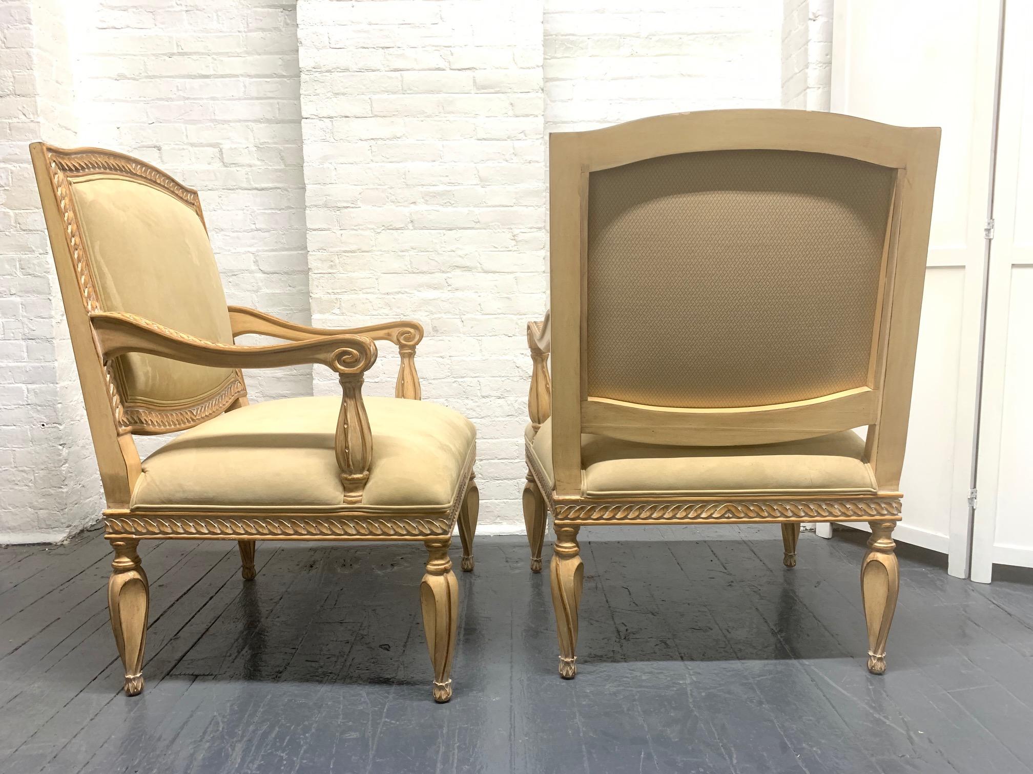 Pair of Kreiss collection armchairs in ultra-suede with a decorative painted wood frame.