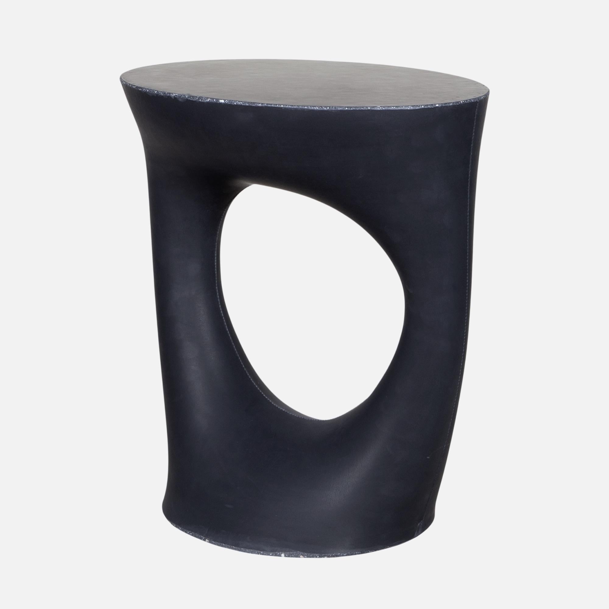 Industrial, organic and sculptural, the Kreten side tables are concrete furniture like you haven’t seen before. Original pieces are created in Souda's Brooklyn studio by casting concrete into a spandex mold. The unique material combination delivers