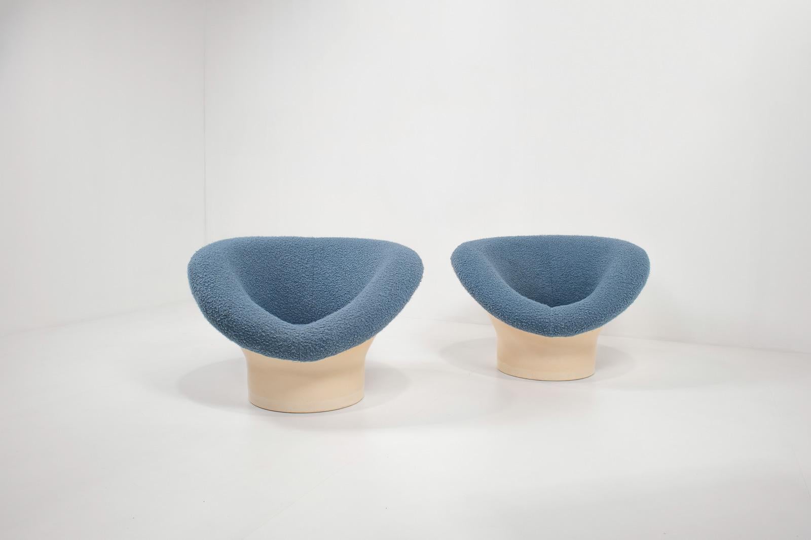 Very groovy chairs that are a real statement piece and give a space age vibe. 
Designed late 1960s by Swedish designer Lennart Bender for Ulferts AB. 

The chairs have been reupholstered in a blue bouclé fabric, and the shell is made of
