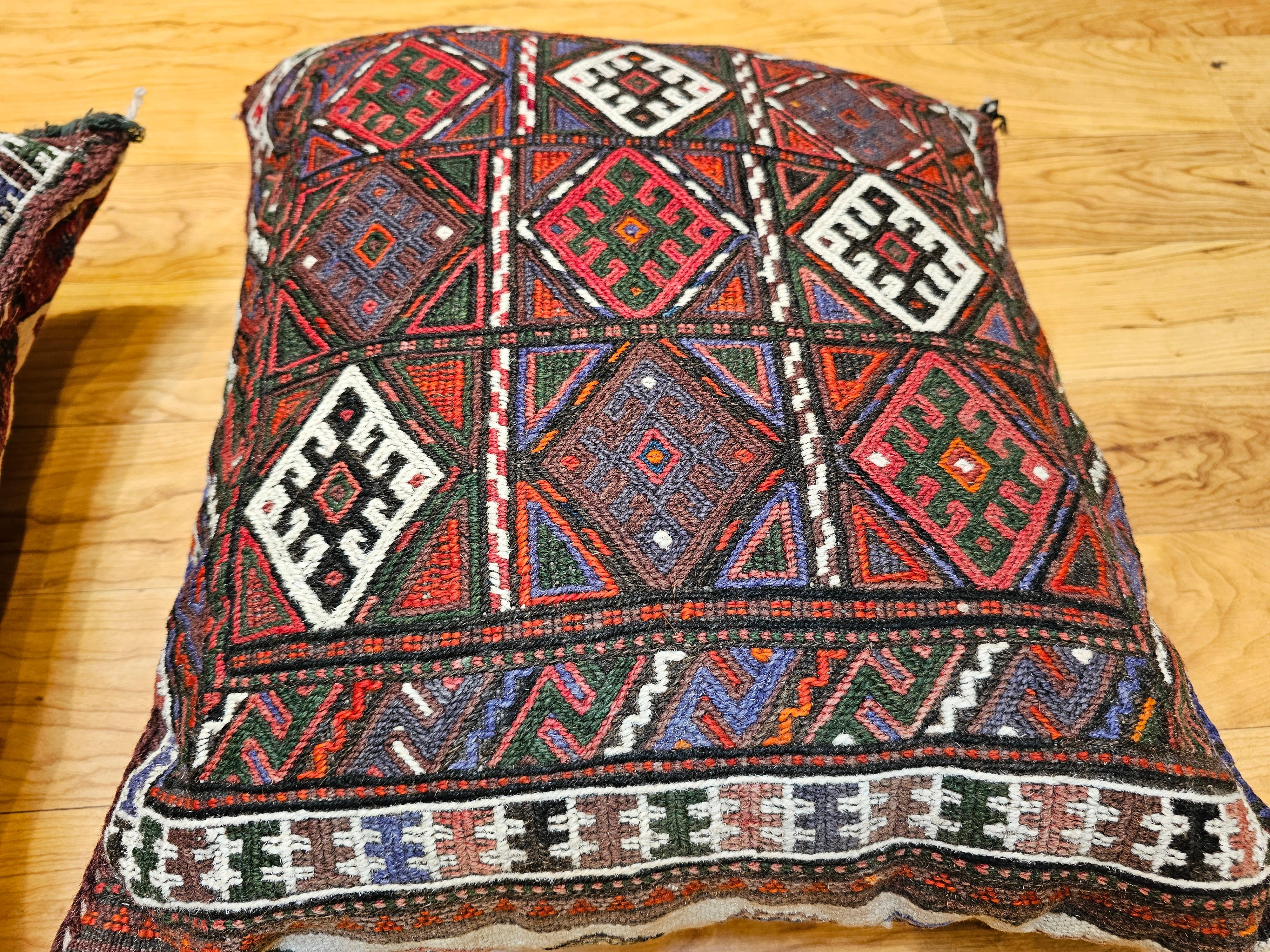 20th Century Pair of Kurdish Saddlebag Pillows in Red, Green, Ivory, Purple, Cornmeal For Sale