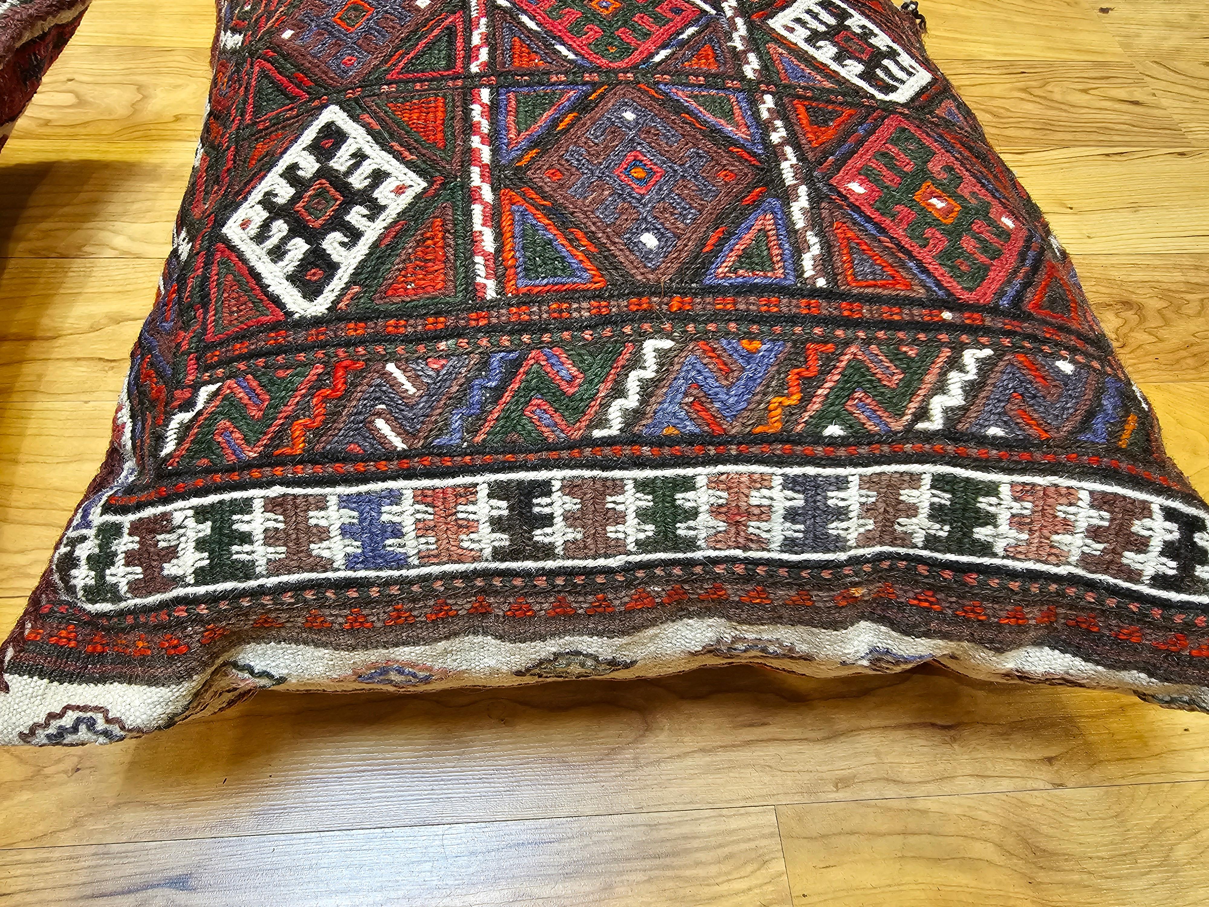 Wool Pair of Kurdish Saddlebag Pillows in Red, Green, Ivory, Purple, Cornmeal For Sale