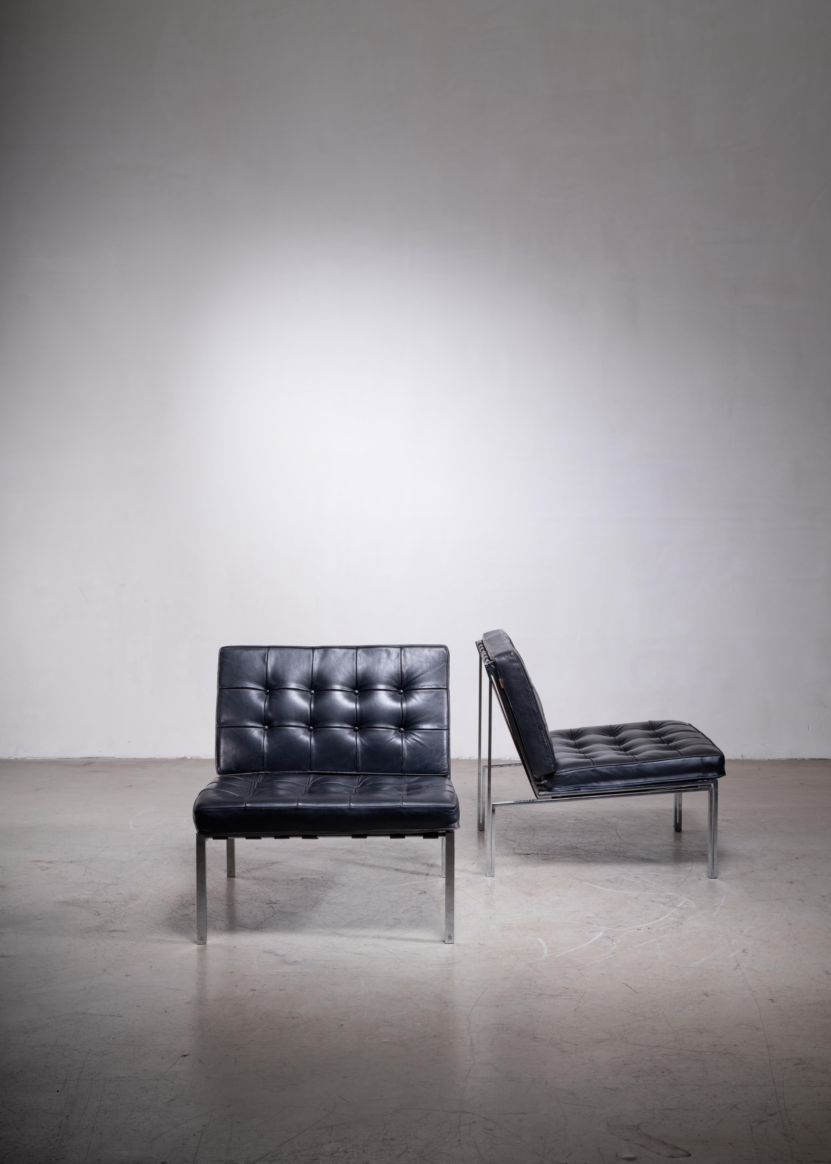 A pair of wonderful and luxurious model 'KT 221' easy chairs by Swiss designer Kurt Thut. The chairs are made of a chrome-plated steel frame with tufted leather cushions, supported by leather straps.