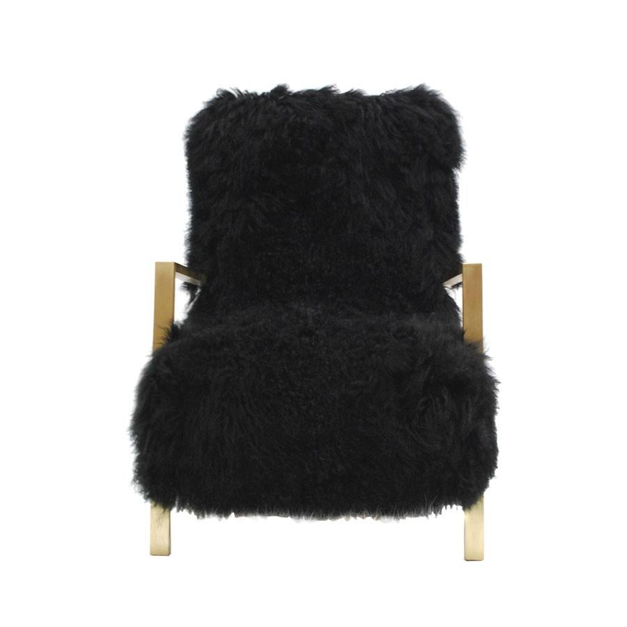 Comfortable armchairs designed by the creative team L.A. Studio and manufactured in Italy. Upholstered in natural black Mongolian goat´s fur.
Base made of solid wood, arms and legs are made of rectangular solid brass tube that continuous as a