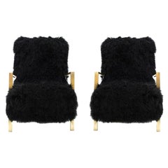 Paire de fauteuils italiens en chèvre de Mongolie noire, contemporains et modernes de I.A. Studio