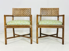 Pair of Laced Rawhide & Rattan Armchairs by McGuire Furniture.