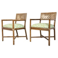 Pair of Laced Rawhide & Rattan Armchairs by McGuire Furniture.