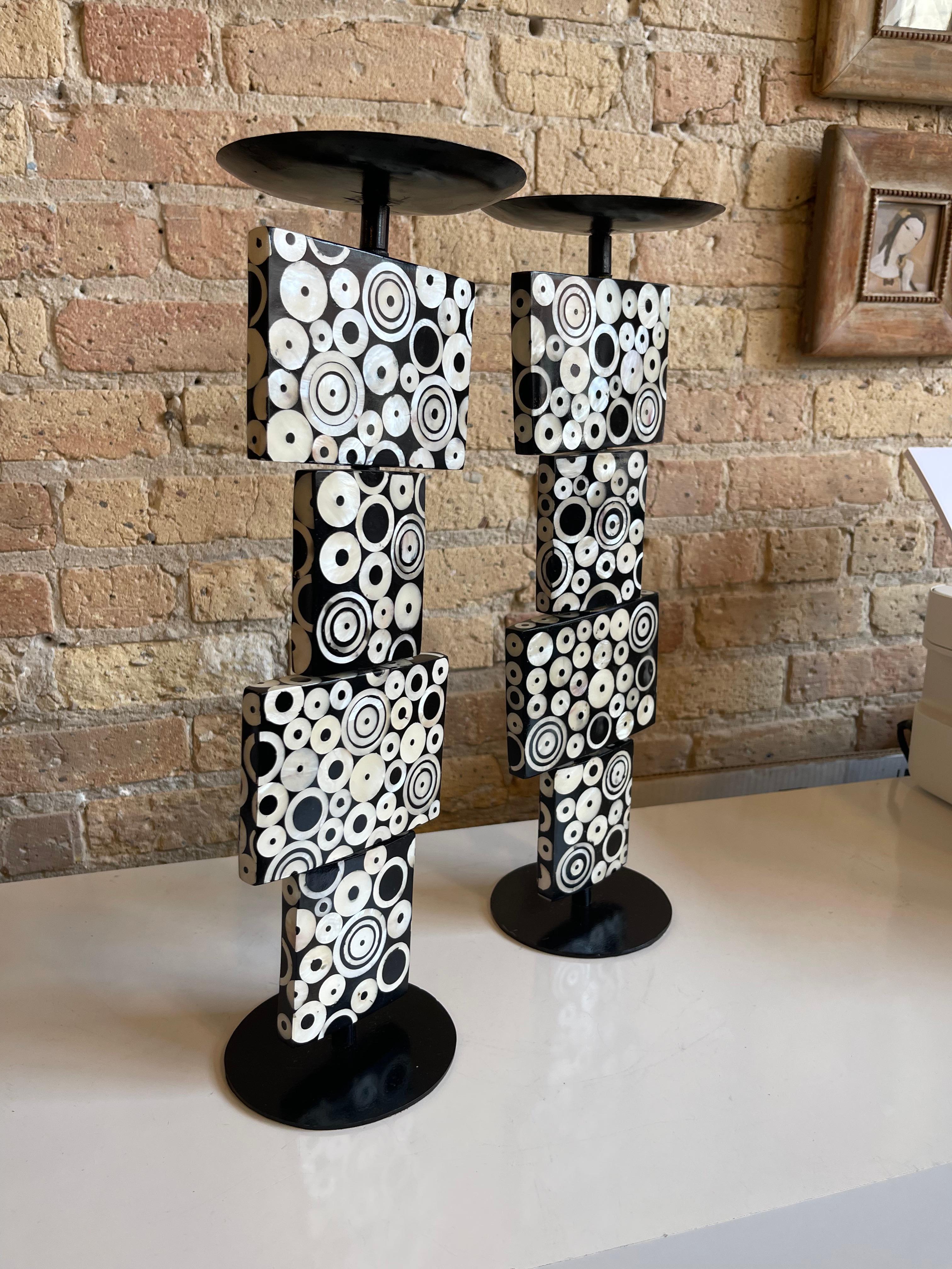 Striking pair of lacquer wood and mother of pearl candleholders having adjustable sections by R and Y Augousti Paris.