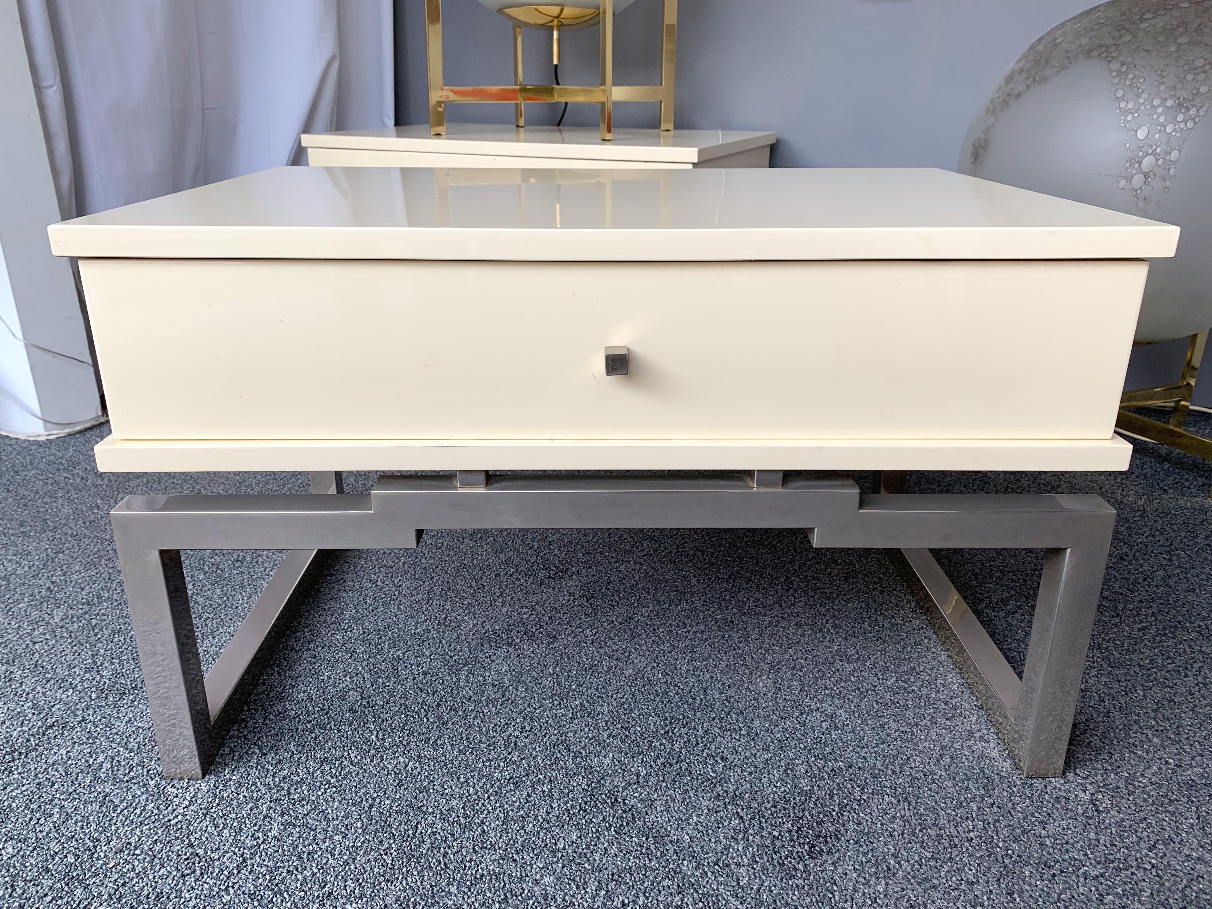 Pair of white ivory Lacquered wood side end or nightstands tables, metal Chrome by Mario Sabot. Famous manufacture like Maison Jansen, Charles, Bagues, Willy Rizzo, Guy Lefevre, Jean Claude Mahey, Romeo Rega, Hollywood Regency