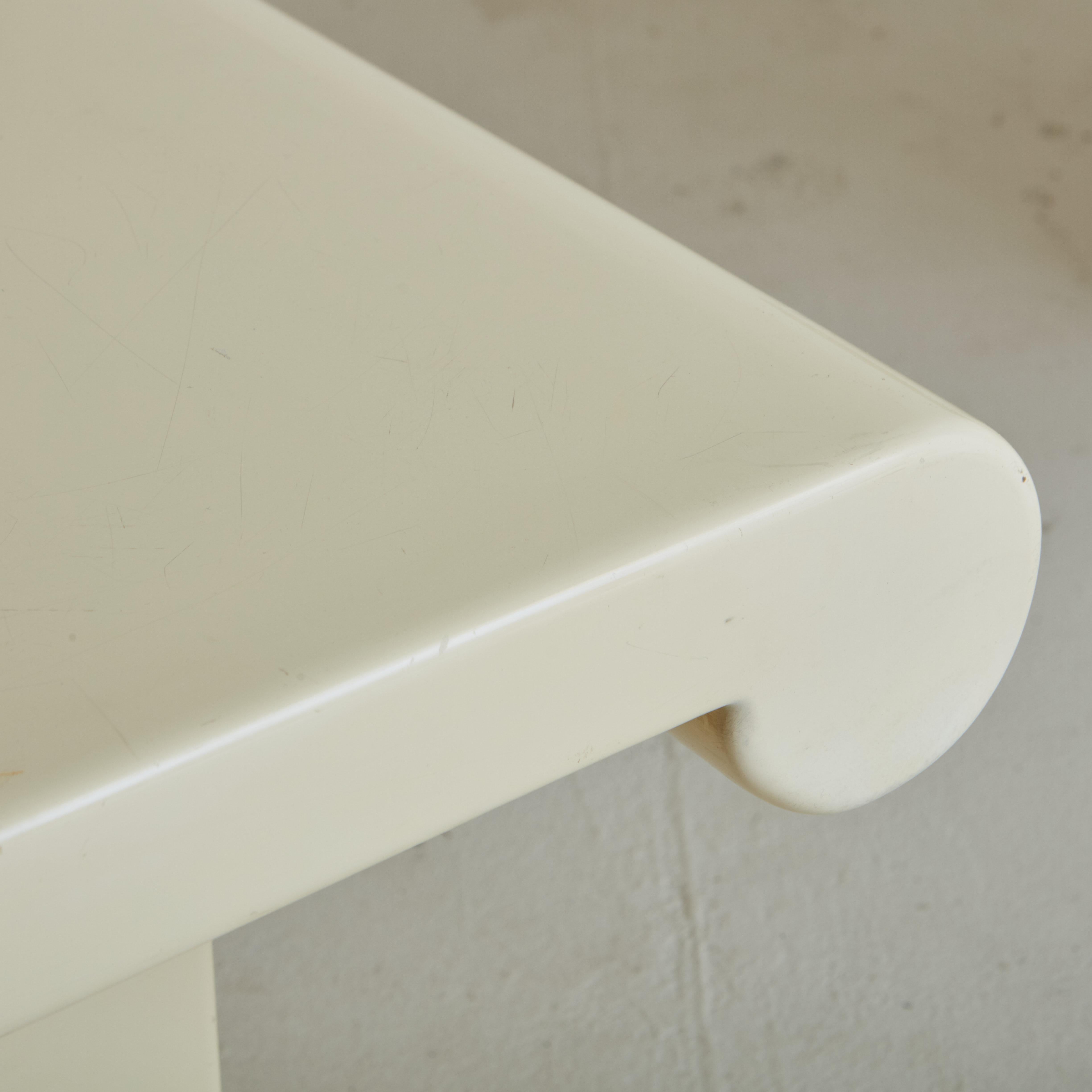 Pair of  white lacquered side table by Marzio Cecchi for Studio Most. The two identical pieces inspired by Greek doric columns are reminescent of Post-Modernism, an architectural, furniture and product design mid-century movement that took