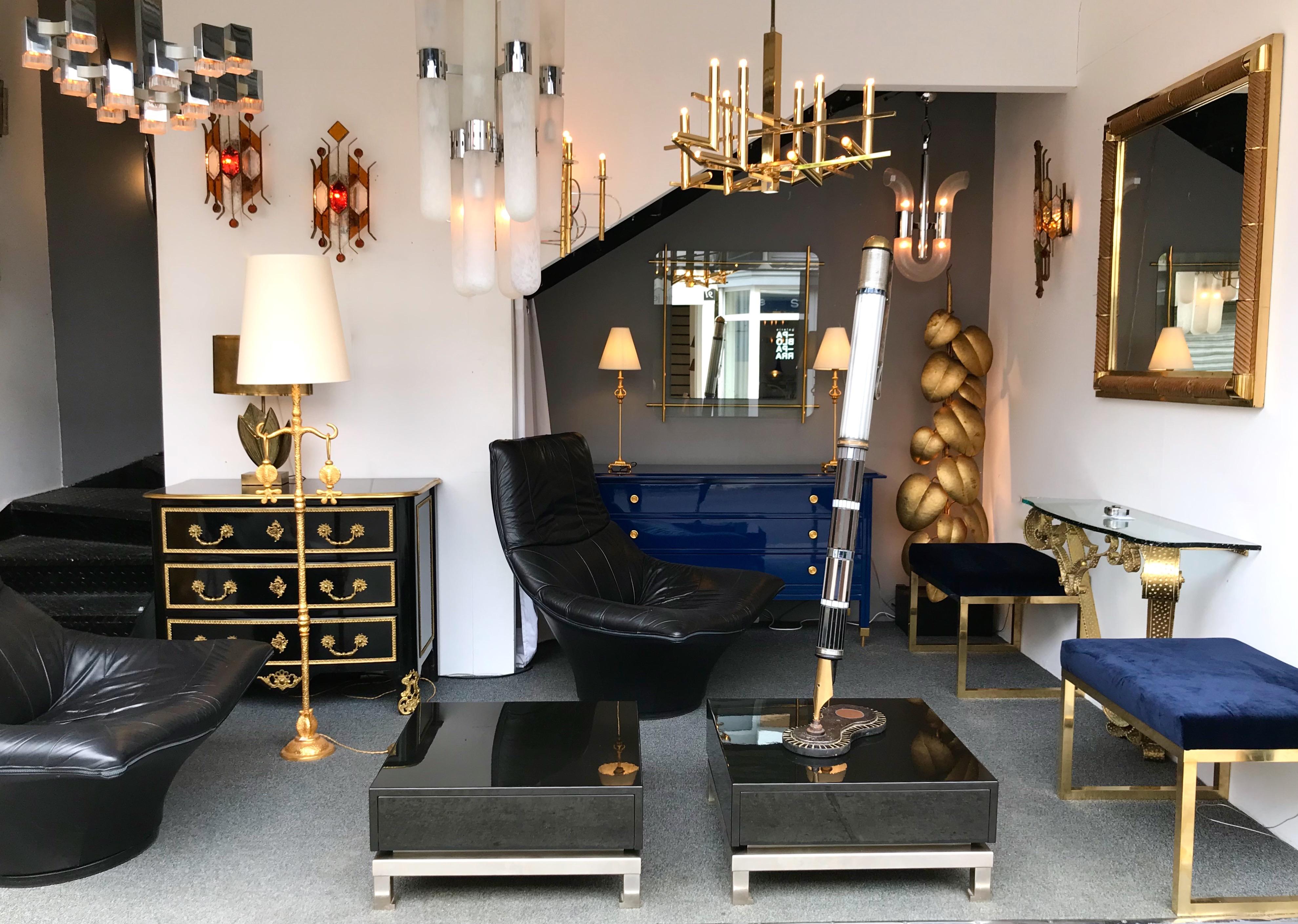 Large rare model of side, end, low or coffee tables or nightstands by the designer Guy Lefevre for Maison Jansen. Black lacquered wood and nickeled brass feet.