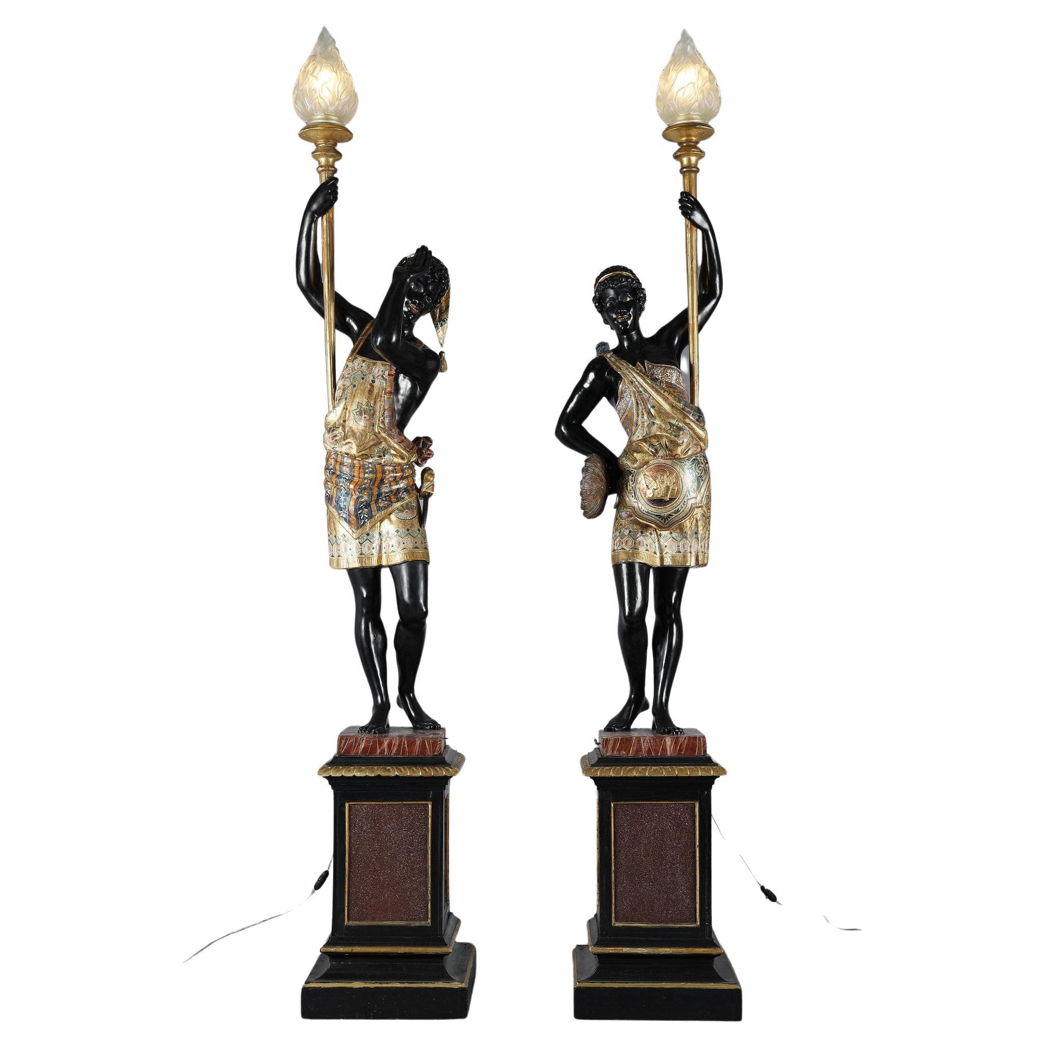 Pair of lacquered wood torchholders depicting Nubians For Sale