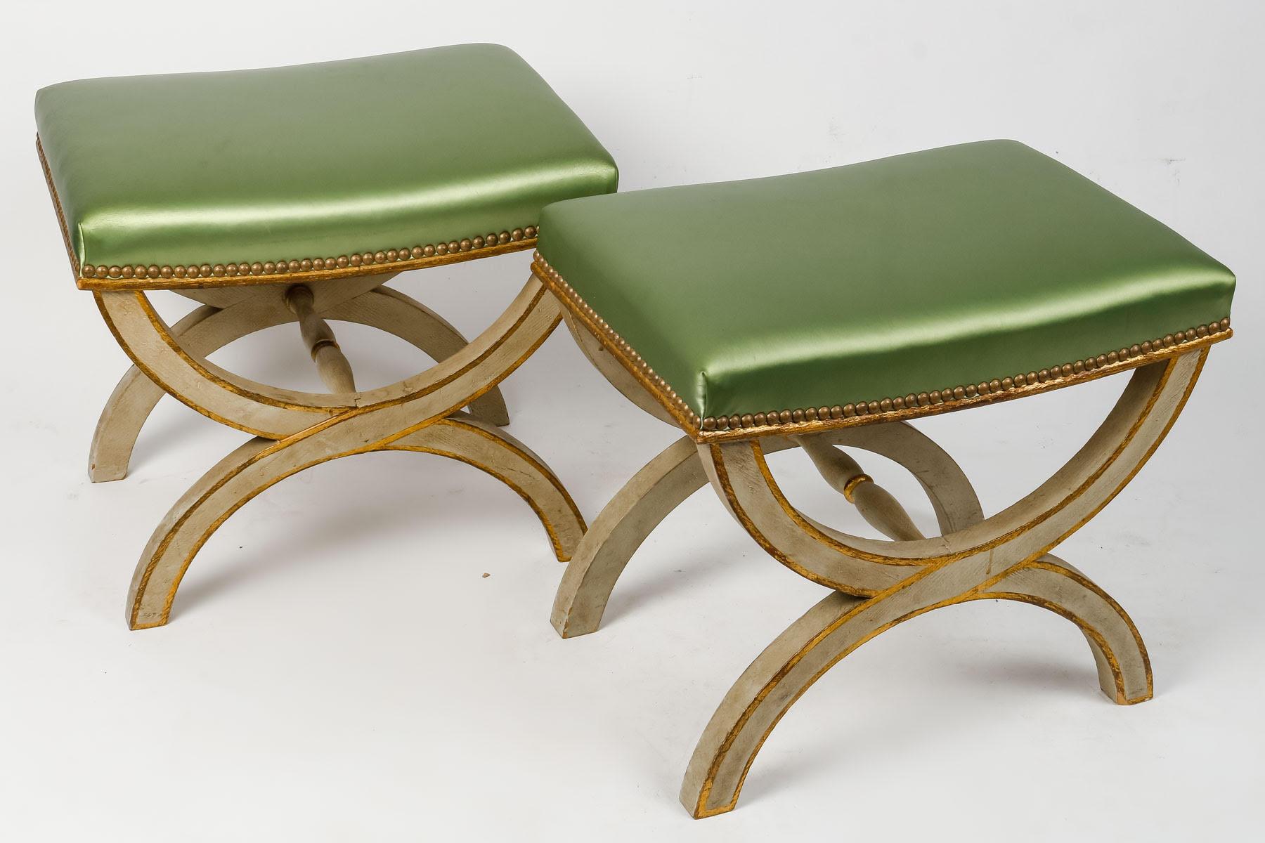 Pair of Lacquered Wood X-shaped Stools, Early 20th Century.

Pair of lacquered and gilded wooden X-shaped stools, satin fabric, early 20th century
h: 40cm, w: 46cm, d: 32cm