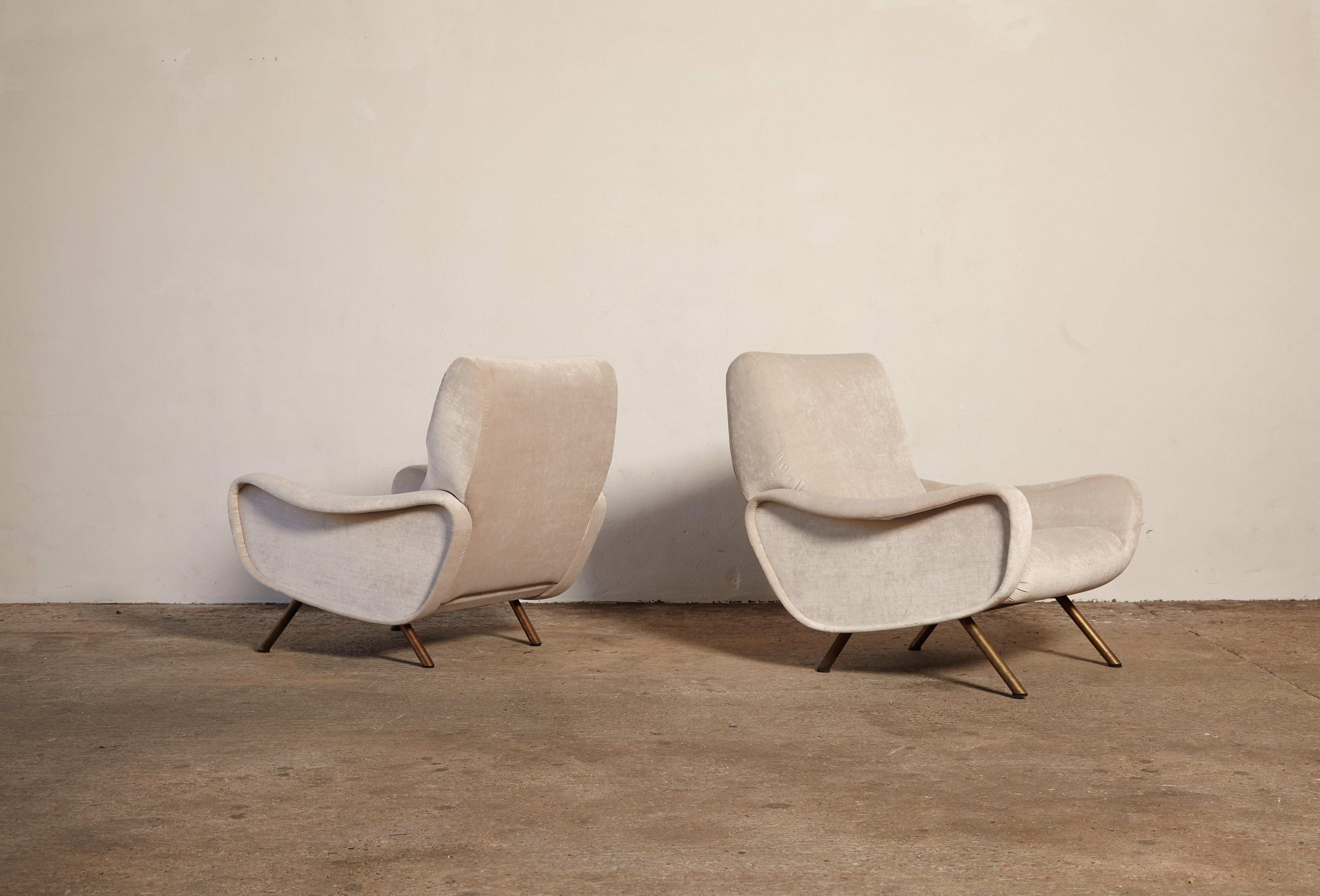 A pair of lady chairs, designed by Marco Zanuso, Italy. Upholstered in an off white cotton velvet.