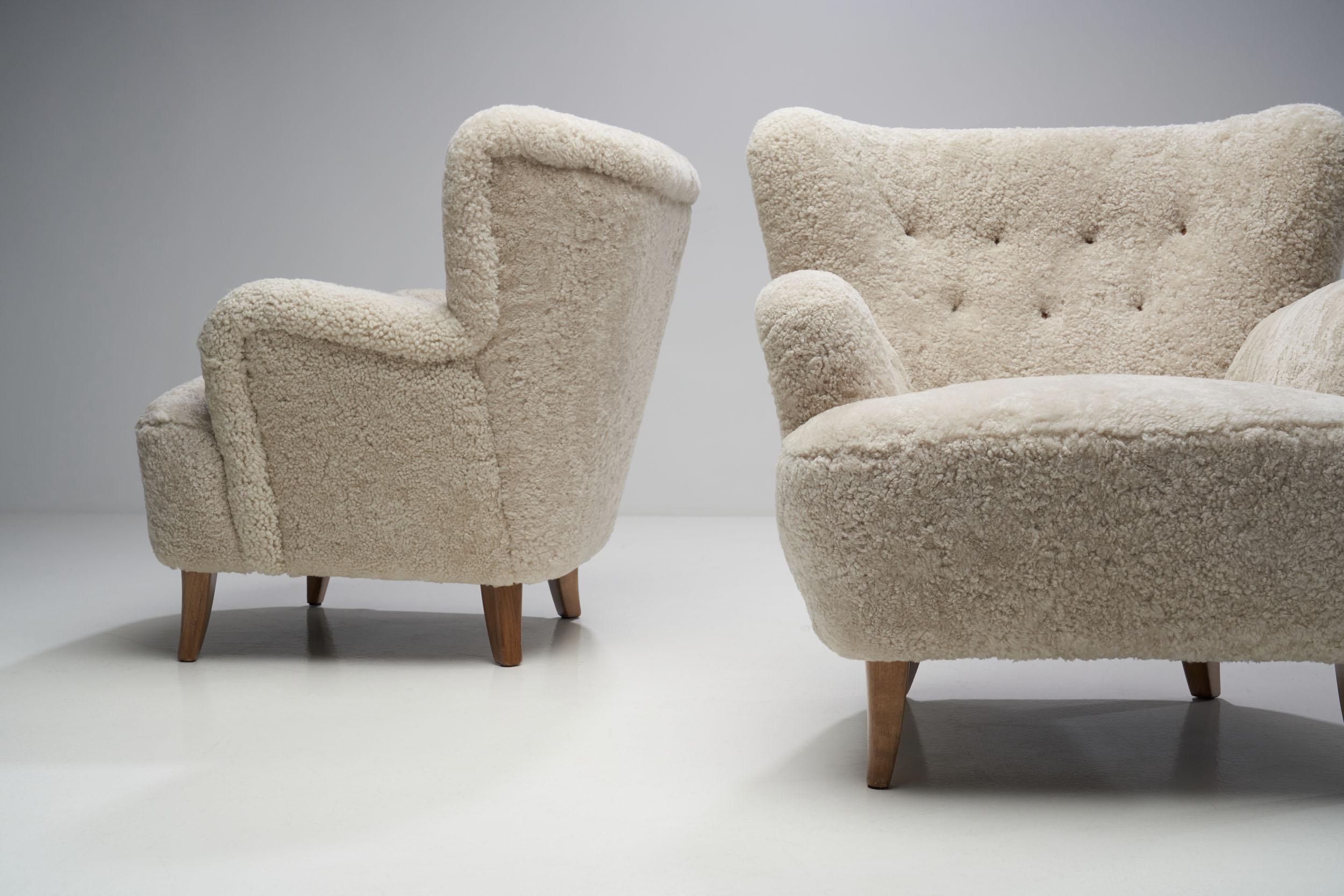 Mid-20th Century Pair of “Laila” Armchairs in Sheepskin by Ilmari Lappalainen, Finland 1948 For Sale