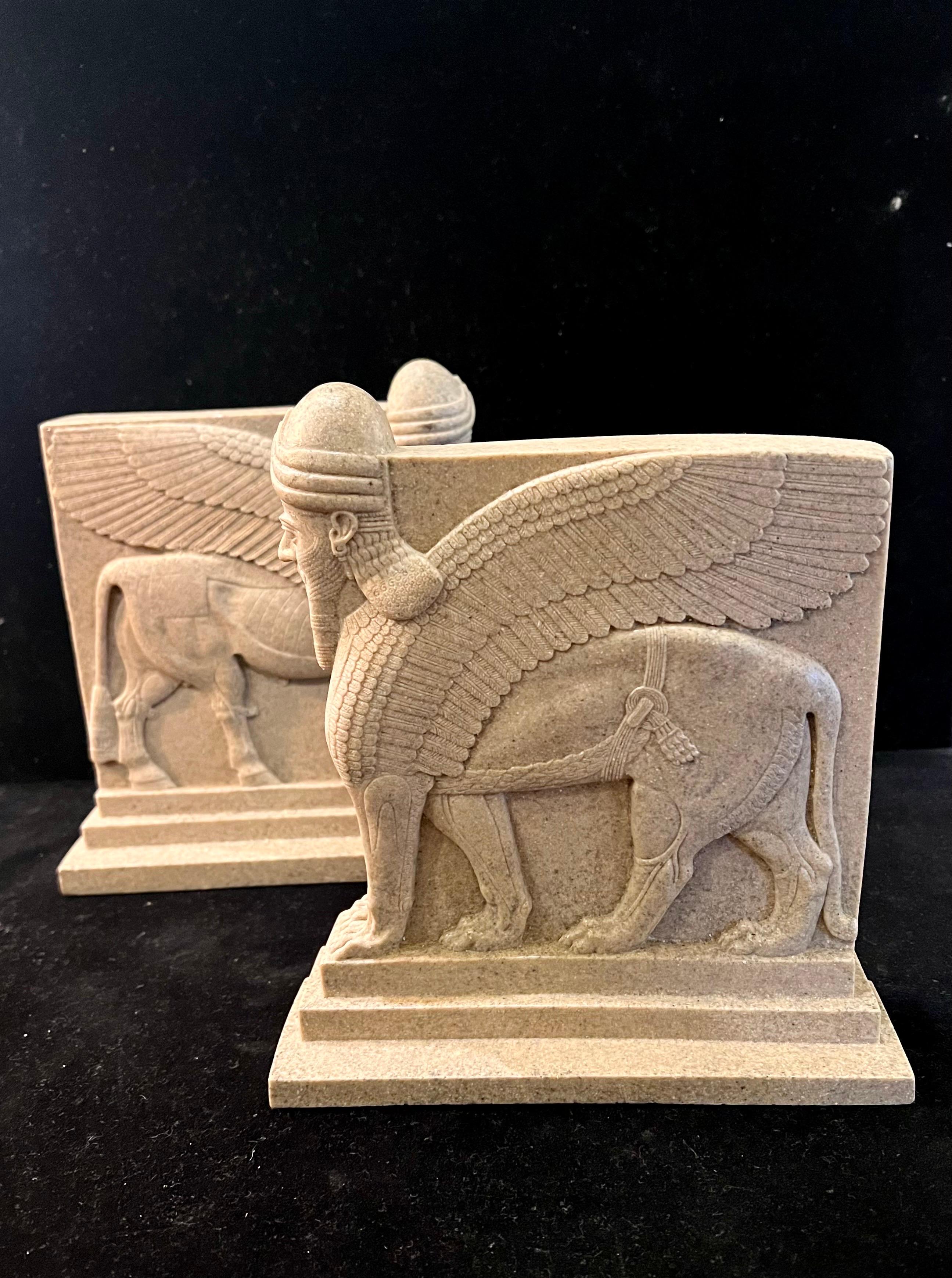 Elegant beautiful pair of solid resin bookends circa 1980's decorative Assyrian Winged Liongreat example of Mesopotamian Art.
