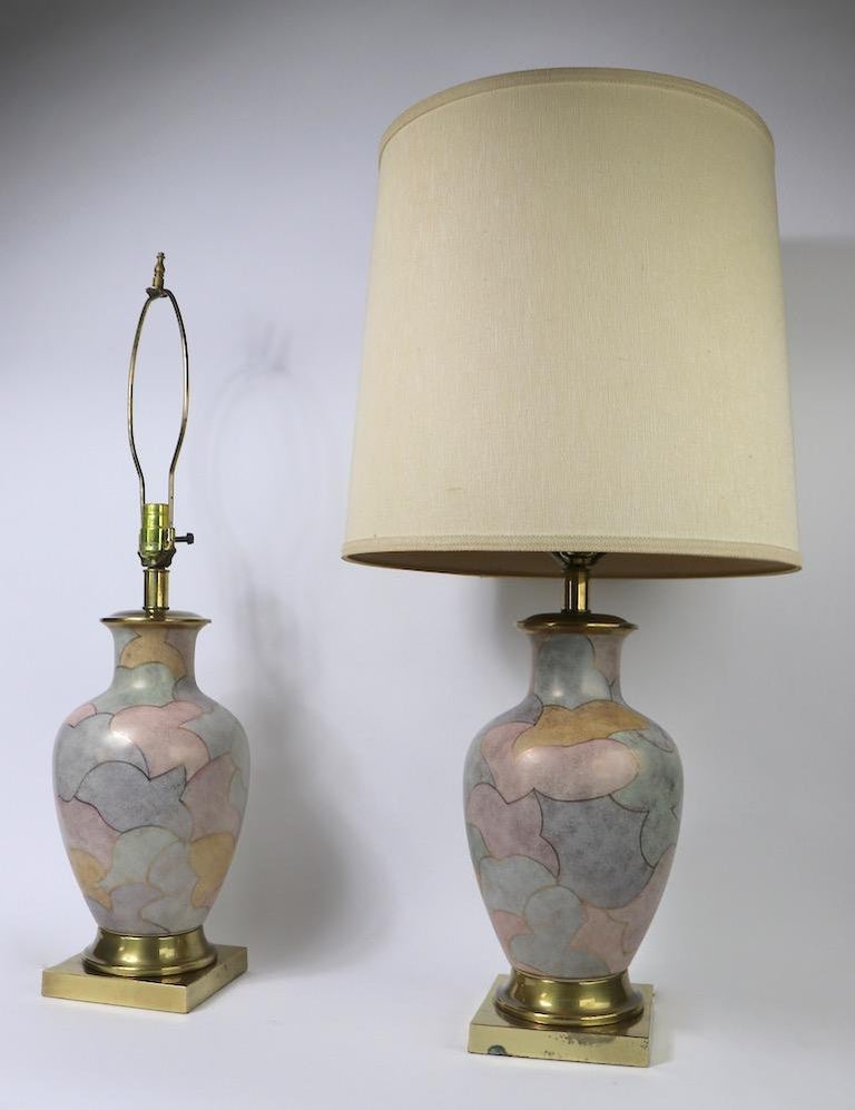 Glamorous ceramic lamps by Frederick Cooper. Both are in very working condition, one lamps has minor tarnish to the base, as pictured. Shade not included. Height to top of socket 20 x total height 29 inches base 6 x 6 diameter of body 7 inches.