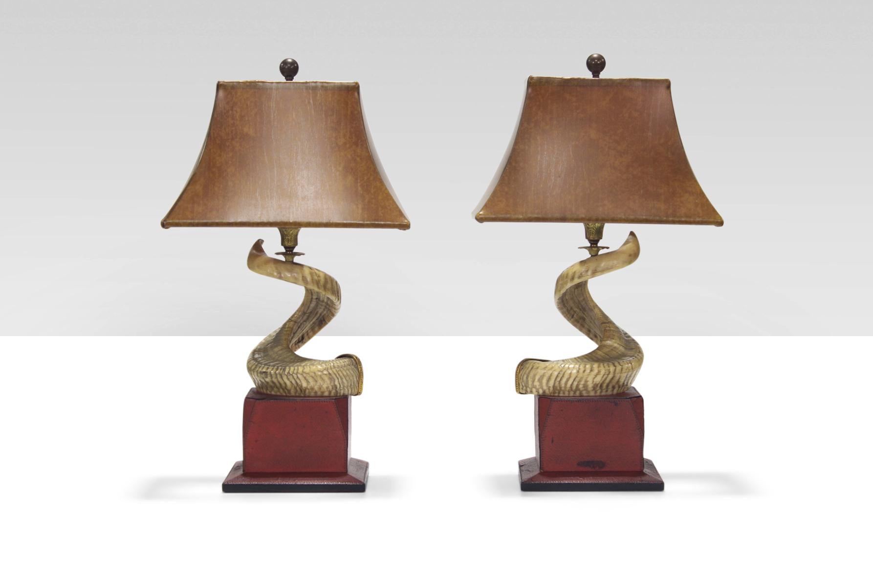 Pair of dramatic and decorative table lamps by Gucci. Various materials and refined detailing. Made in Italy circa the 1970s. Signed.