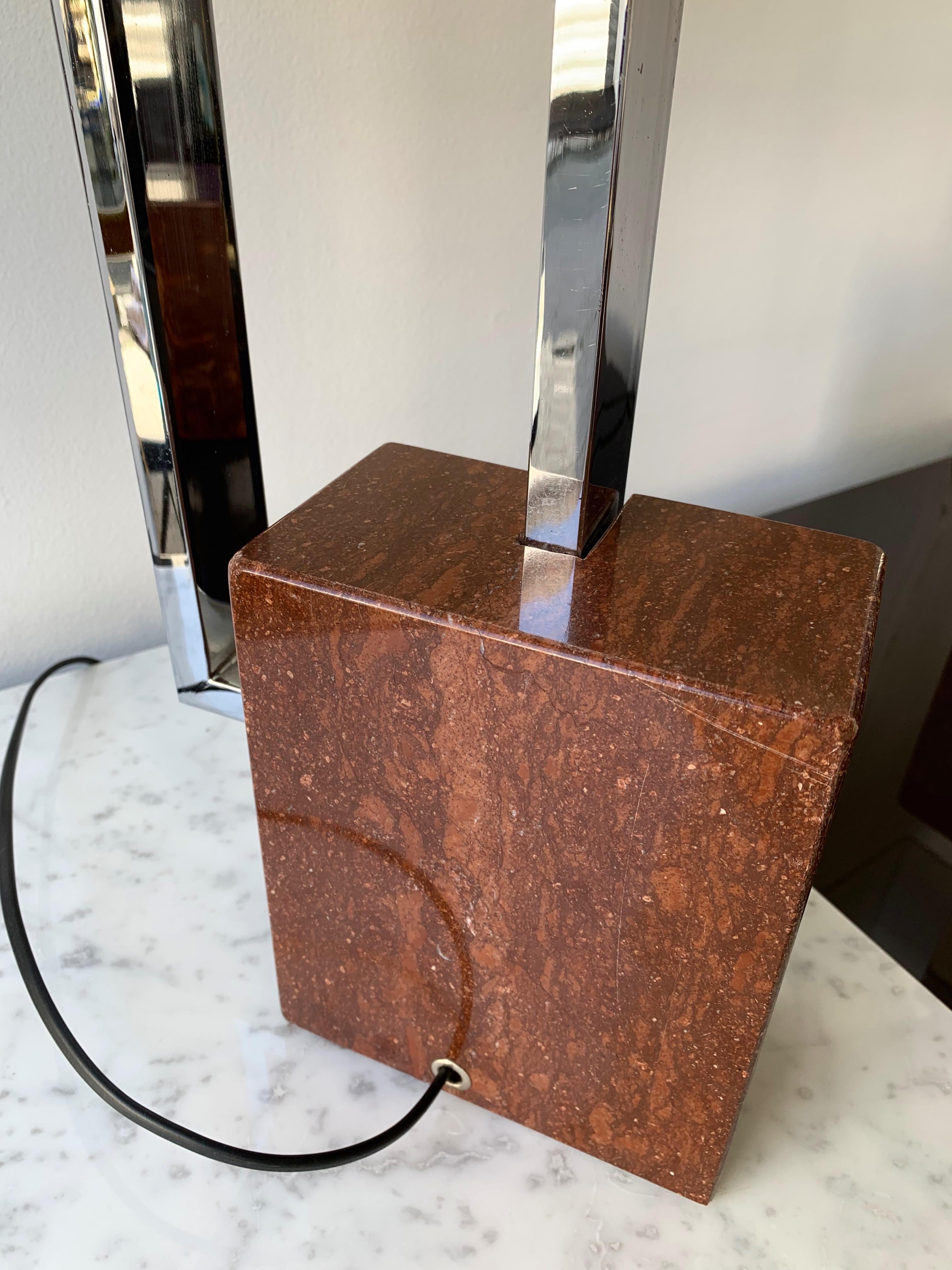 Geometrical pair of table or bedside lamps by the manufacture Banci Firenze. Red marble base and metal chrome.  Famous design like Sciolari, Reggiani, Willy Rizzo, Philippe Barbier, Lumi, Luci.

Demonstration shades not included. Measurements lamp