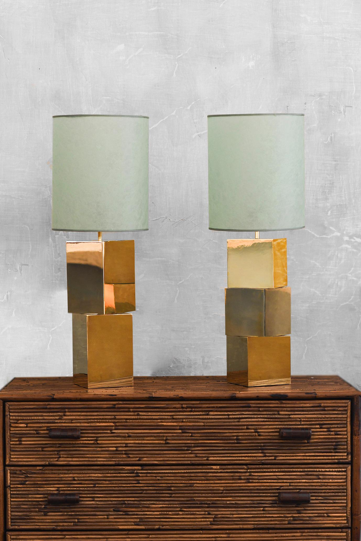 Italian Pair of lamps designed by Umberto Mantineo with brass modules  For Sale