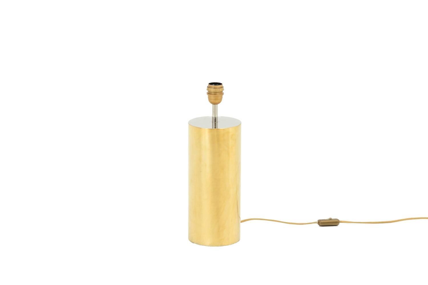 Pair of cylindrical lamps in gilt brushed metal and chromed metal top.

Work realized in the 1970s.

New and functional electrical system.

! The price doesn’t include the lampshade price. However, our workshop can advise you with pleasure and