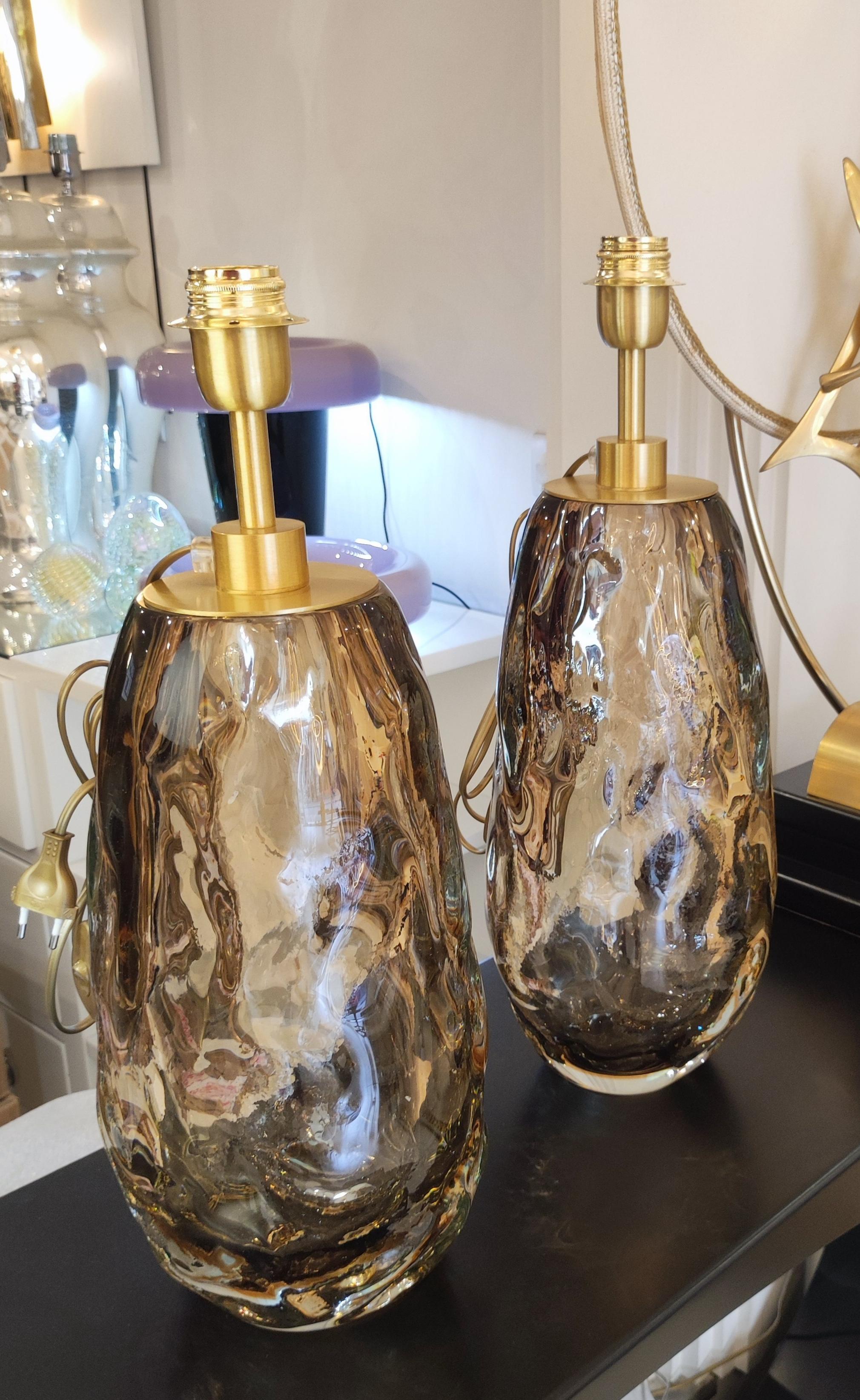 Pair of table lamps in light brown/smoked Murano glass.


.